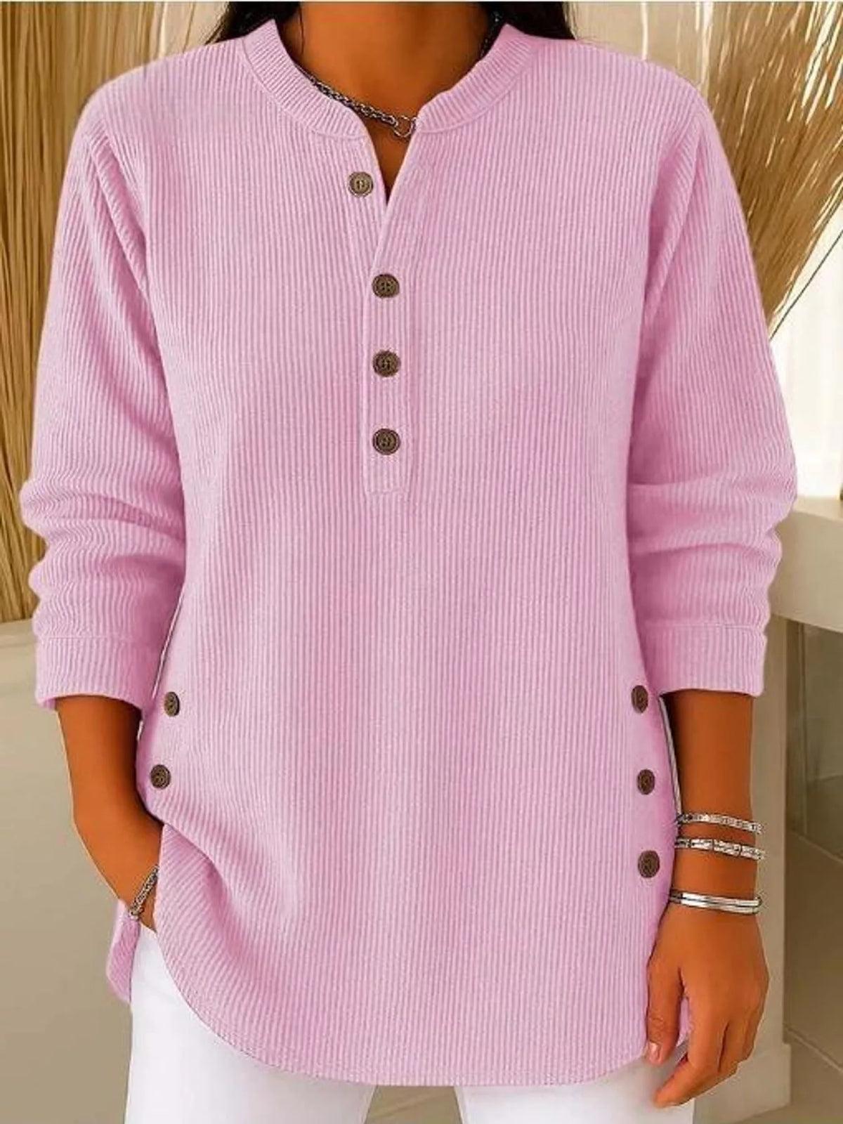 Pink button detail long sleeve top, front view