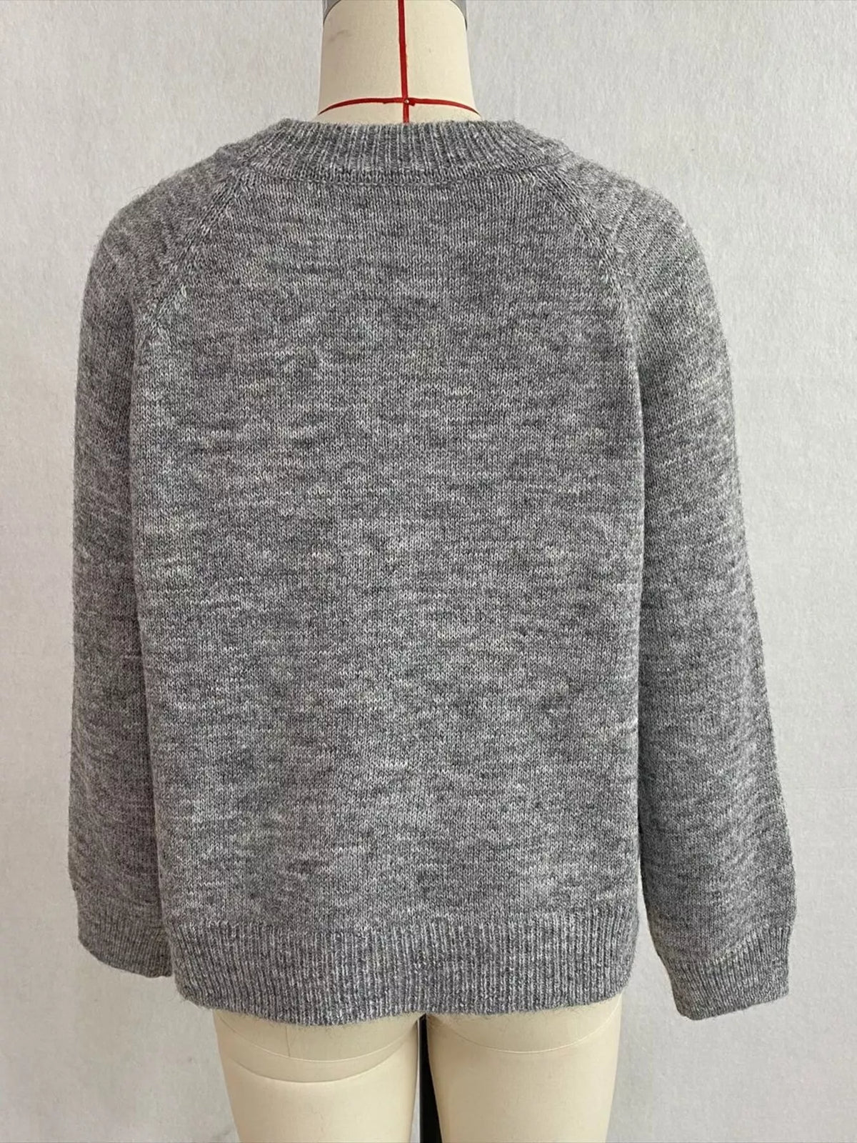 Floral embroidered round-neck sweater in gray, back mannequin view
