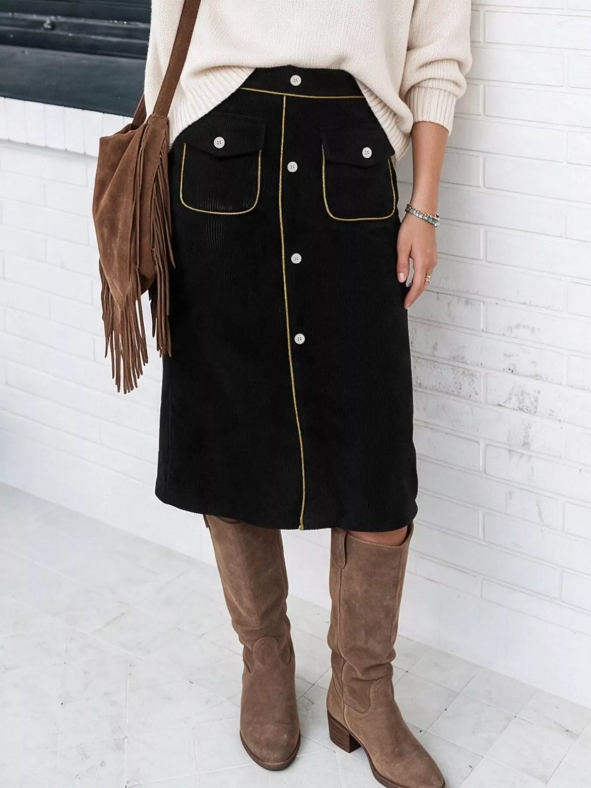 Black corduroy button-front midi skirt, front view