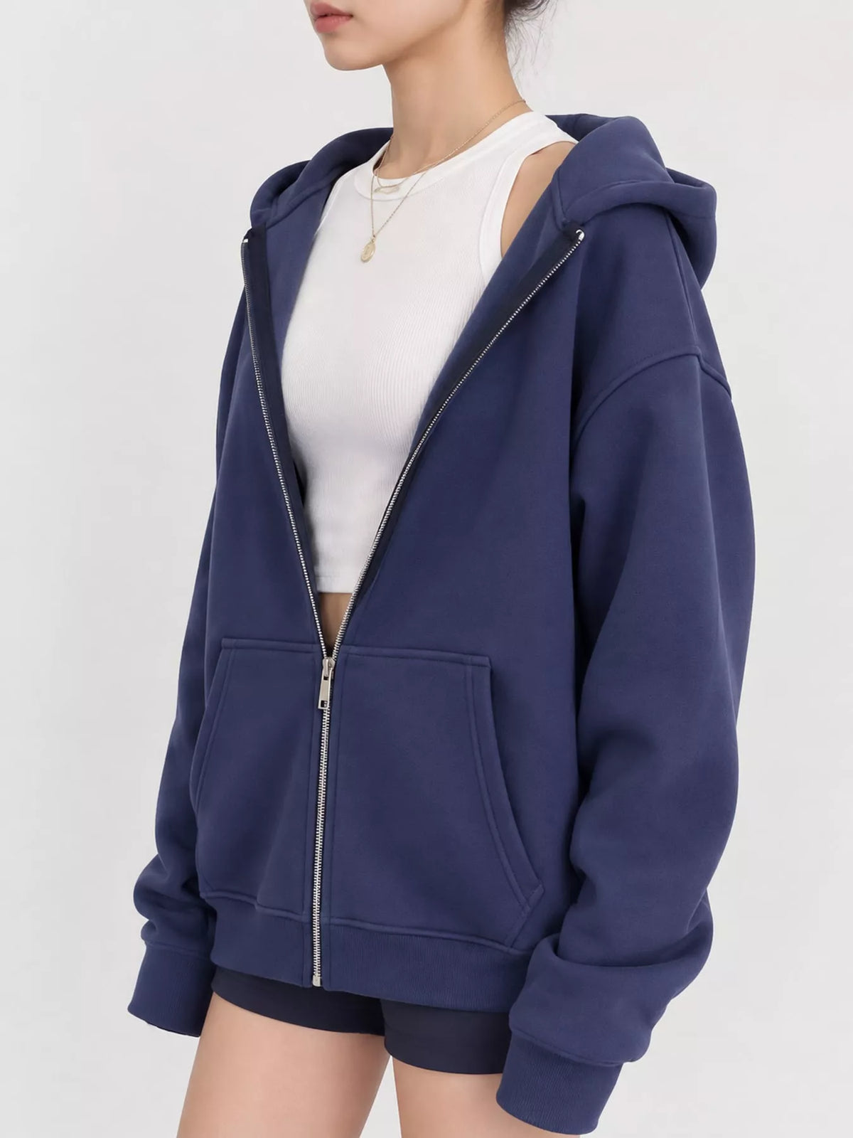 Women's Zip-Up Dropped Shoulder Hoodie in blue — side view