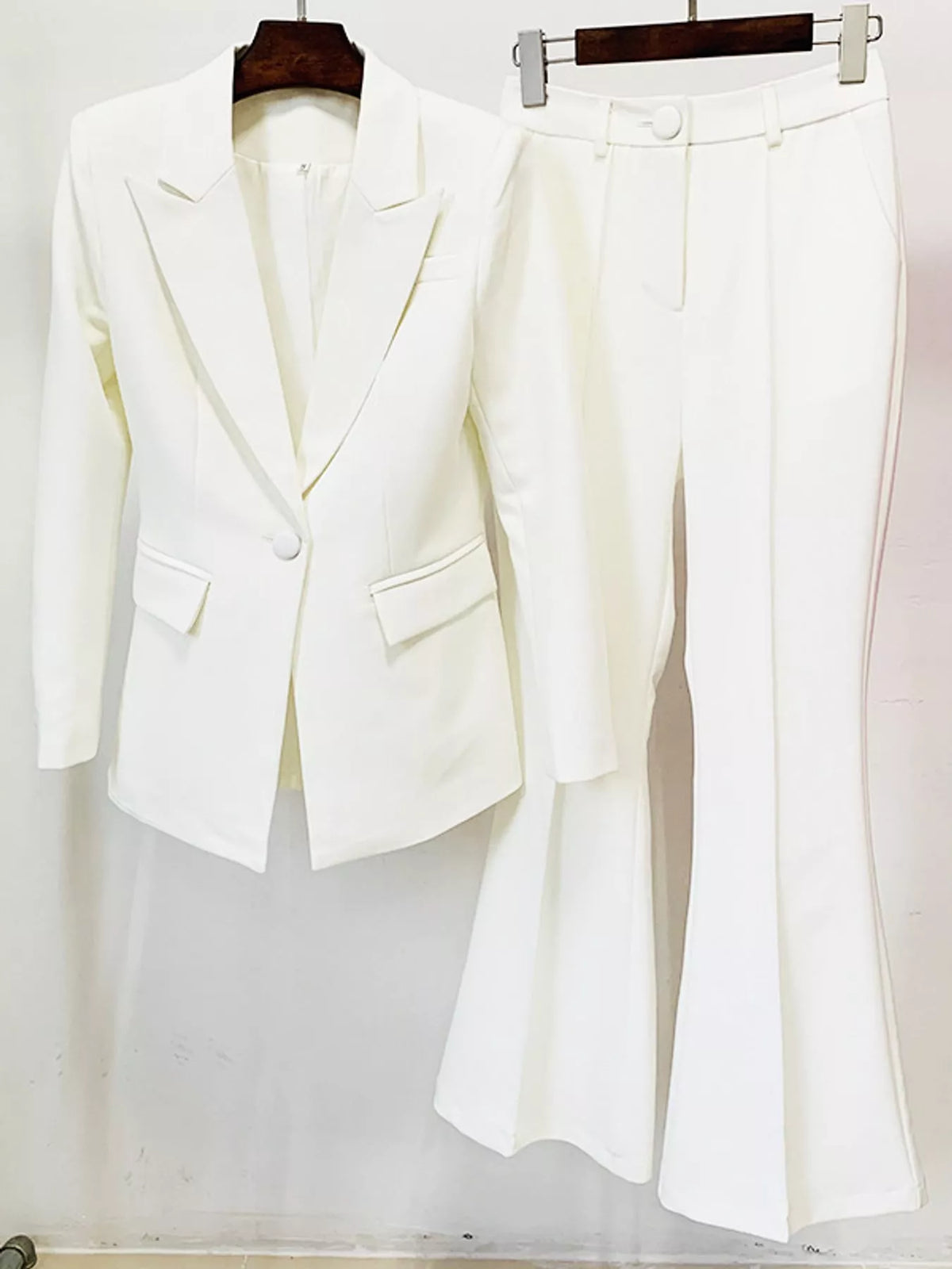 White one-button blazer and flared pants set