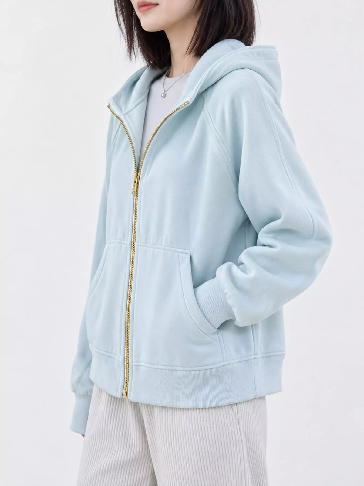 Women's Zip Up Raglan Sleeve Hoodie in light blue — side view