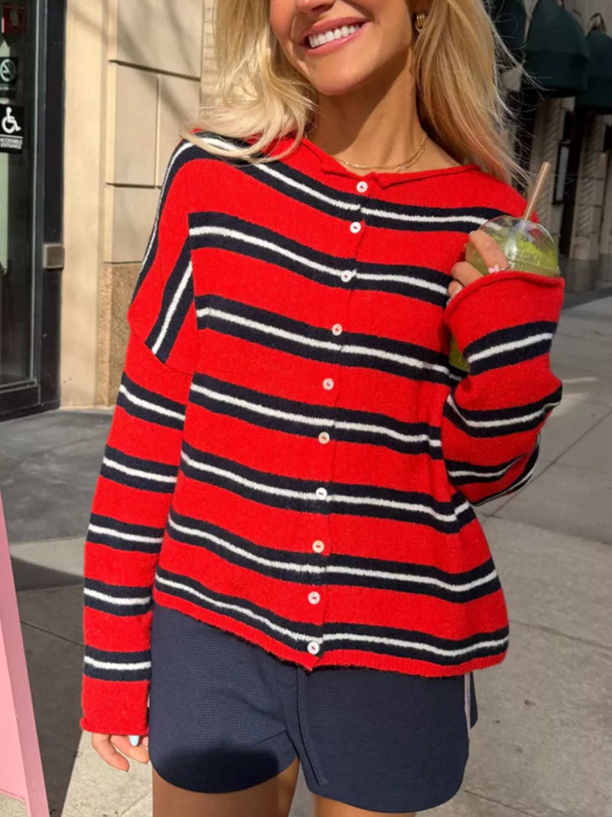 Red and black striped button-front cardigan, front view
