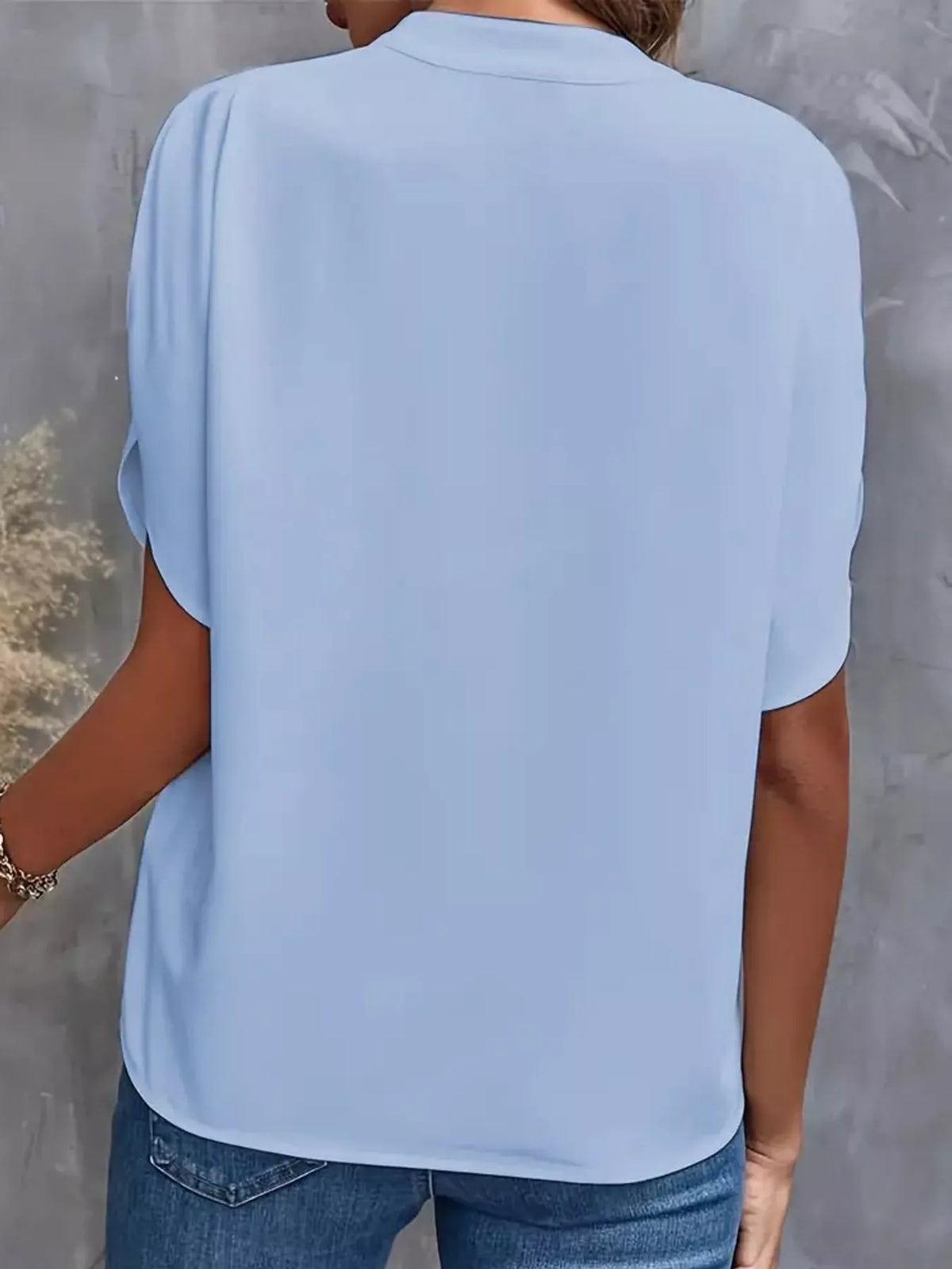 Women's Notched Slit Short Sleeve Blouse in light blue — back view