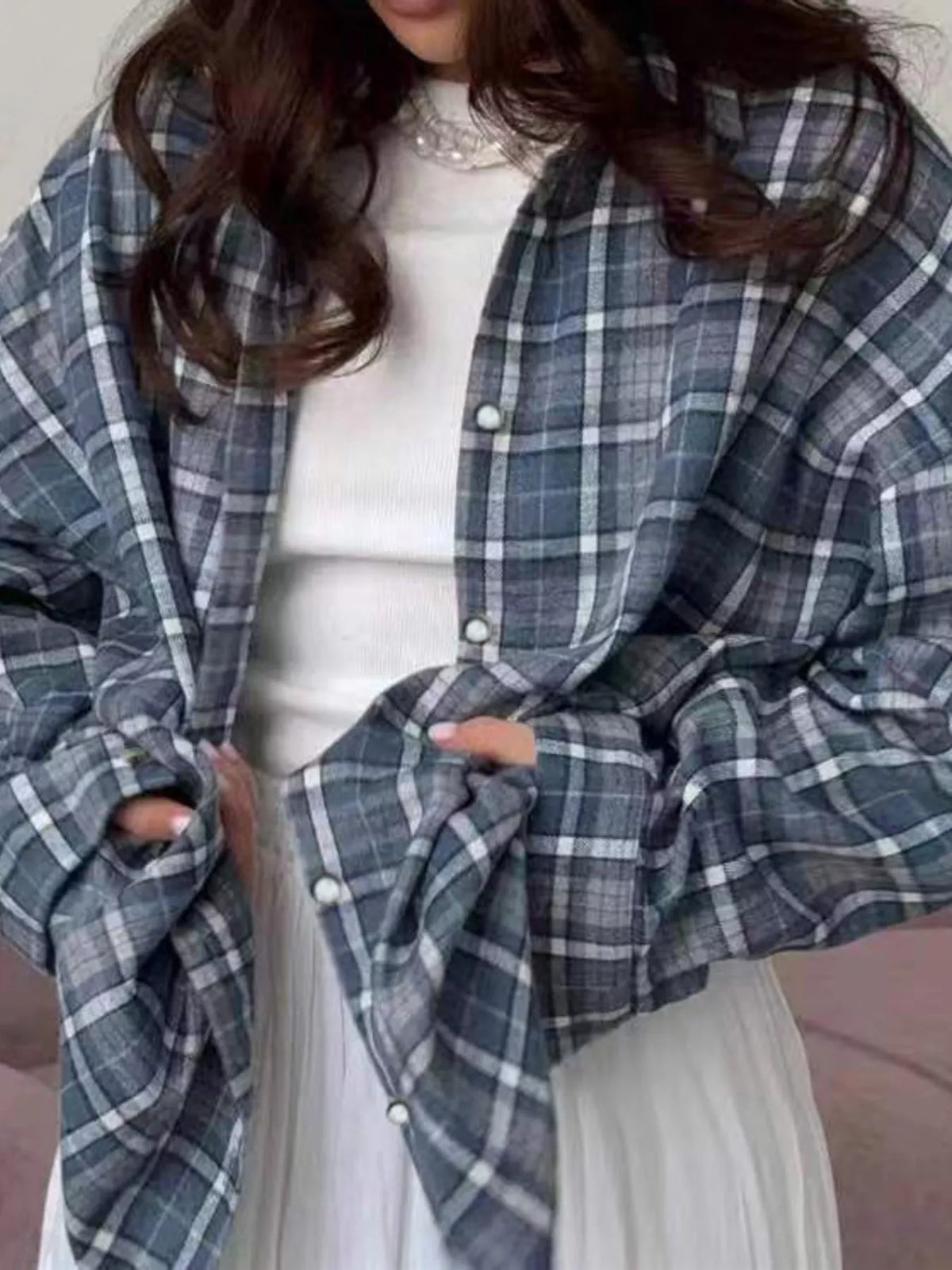 Blue and white plaid button-up shirt with chest pockets