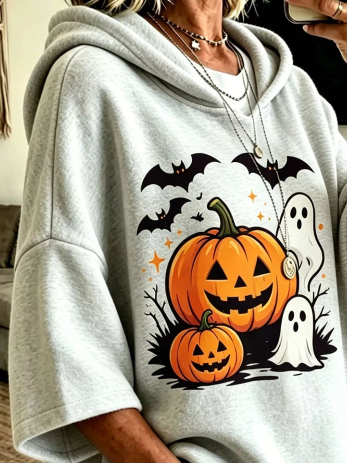 Gray oversized halloween pumpkin ghost hoodie, detail view