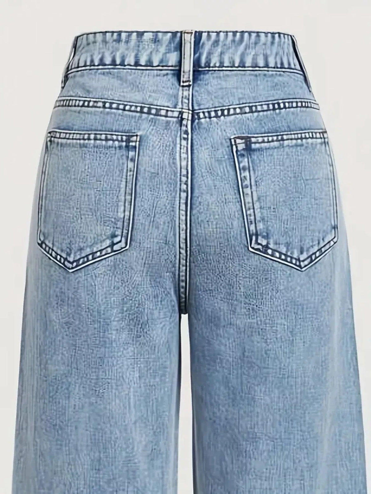 Light blue high-waisted rhinestone wide-leg jeans — design and construction details