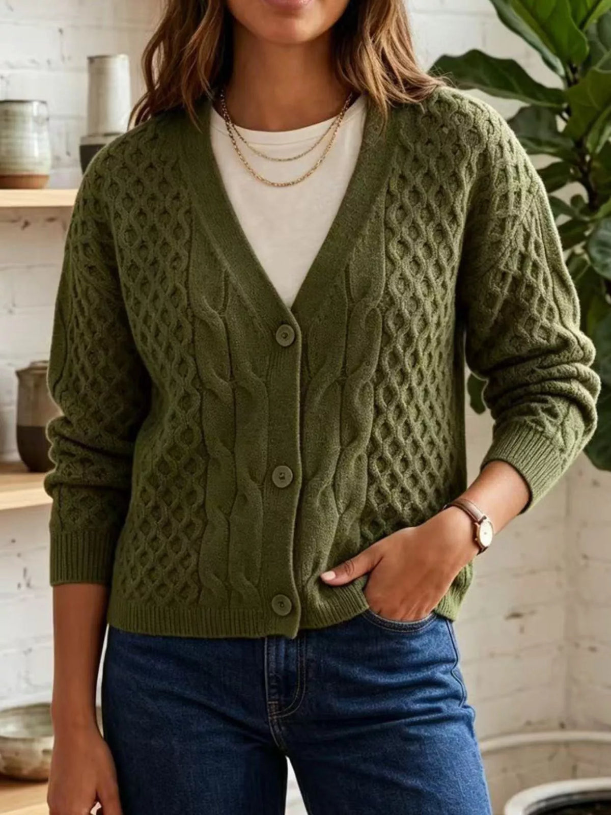 Olive cable-knit v-neck button-front cardigan, front view.