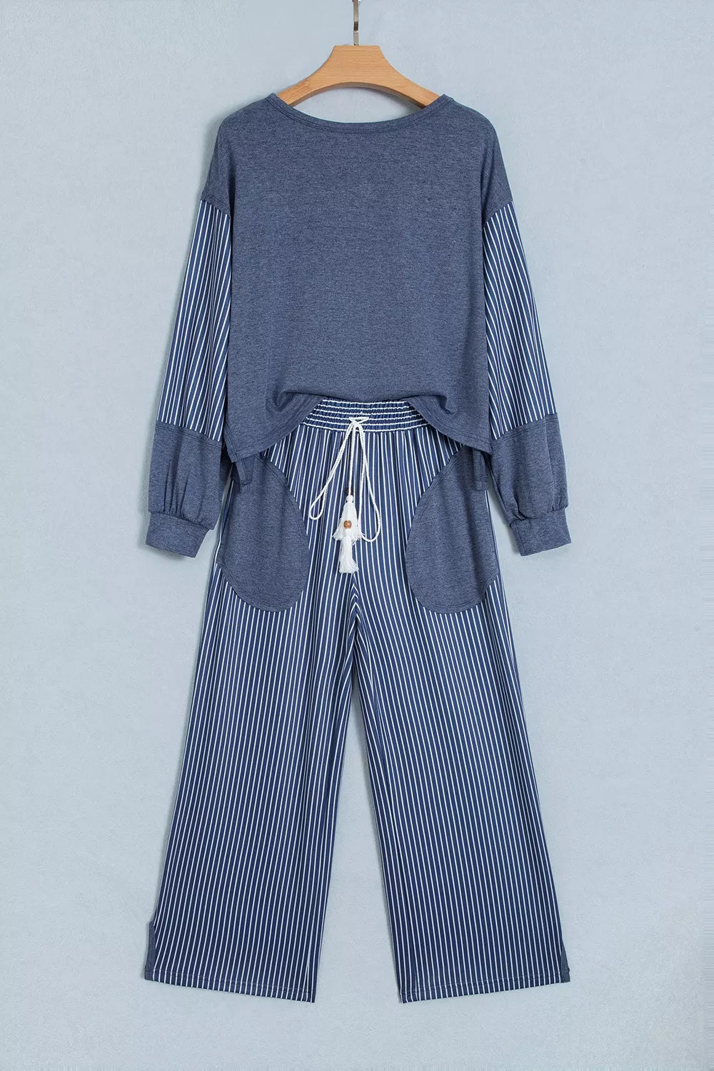 Top and drawstring pants set, blue set hanging front