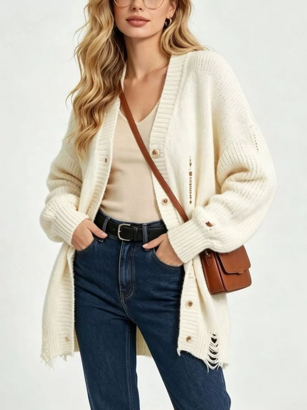 Beige distressed button-down cardigan, front view