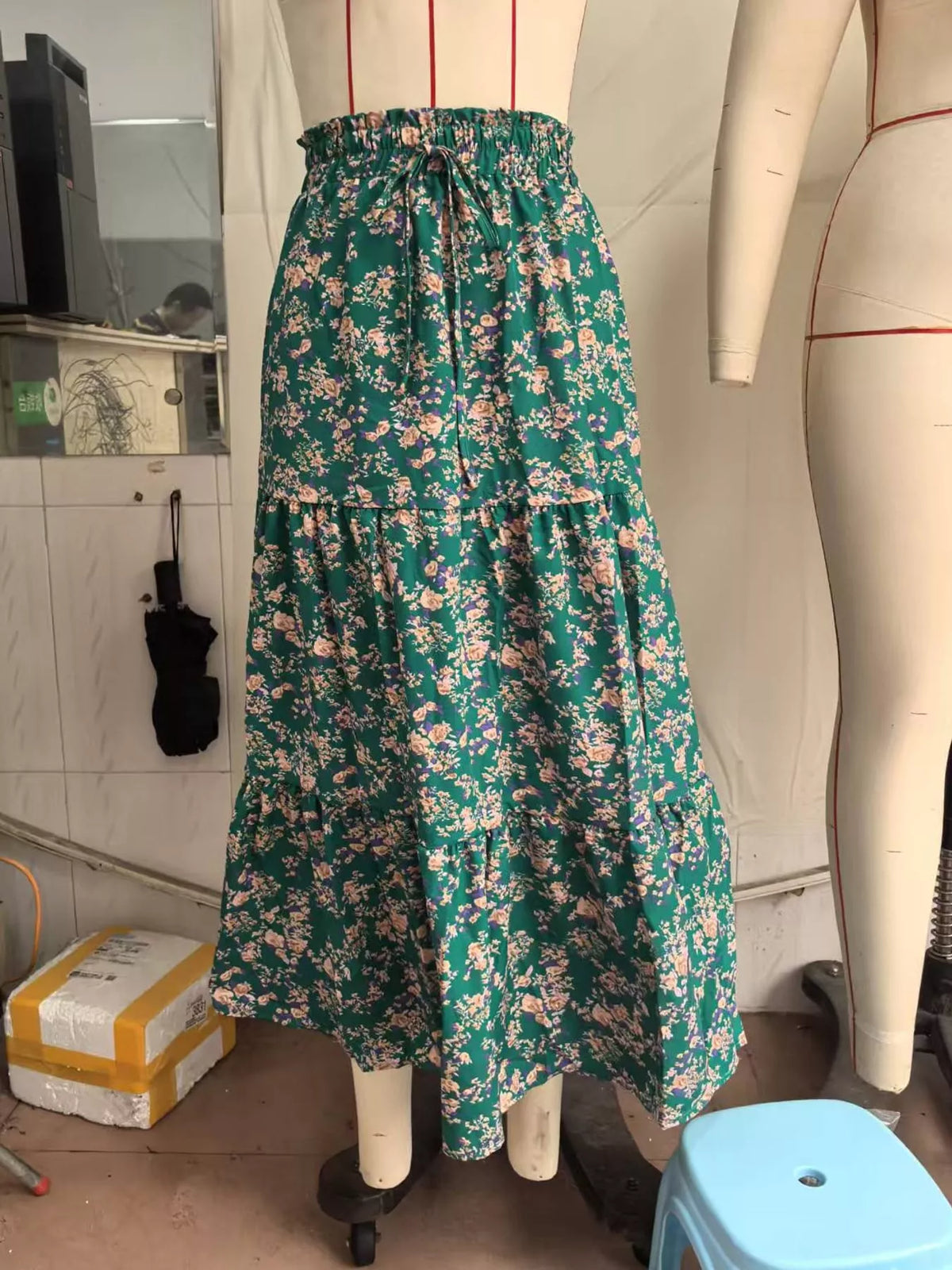 Green floral drawstring tiered skirt — front view