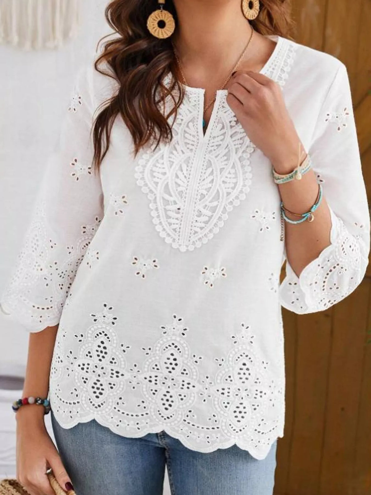 White eyelet embroidered v-neck blouse