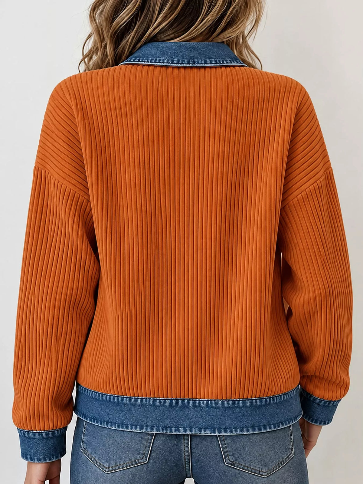 Orange denim-collar ribbed knit zip-up jacket — back view