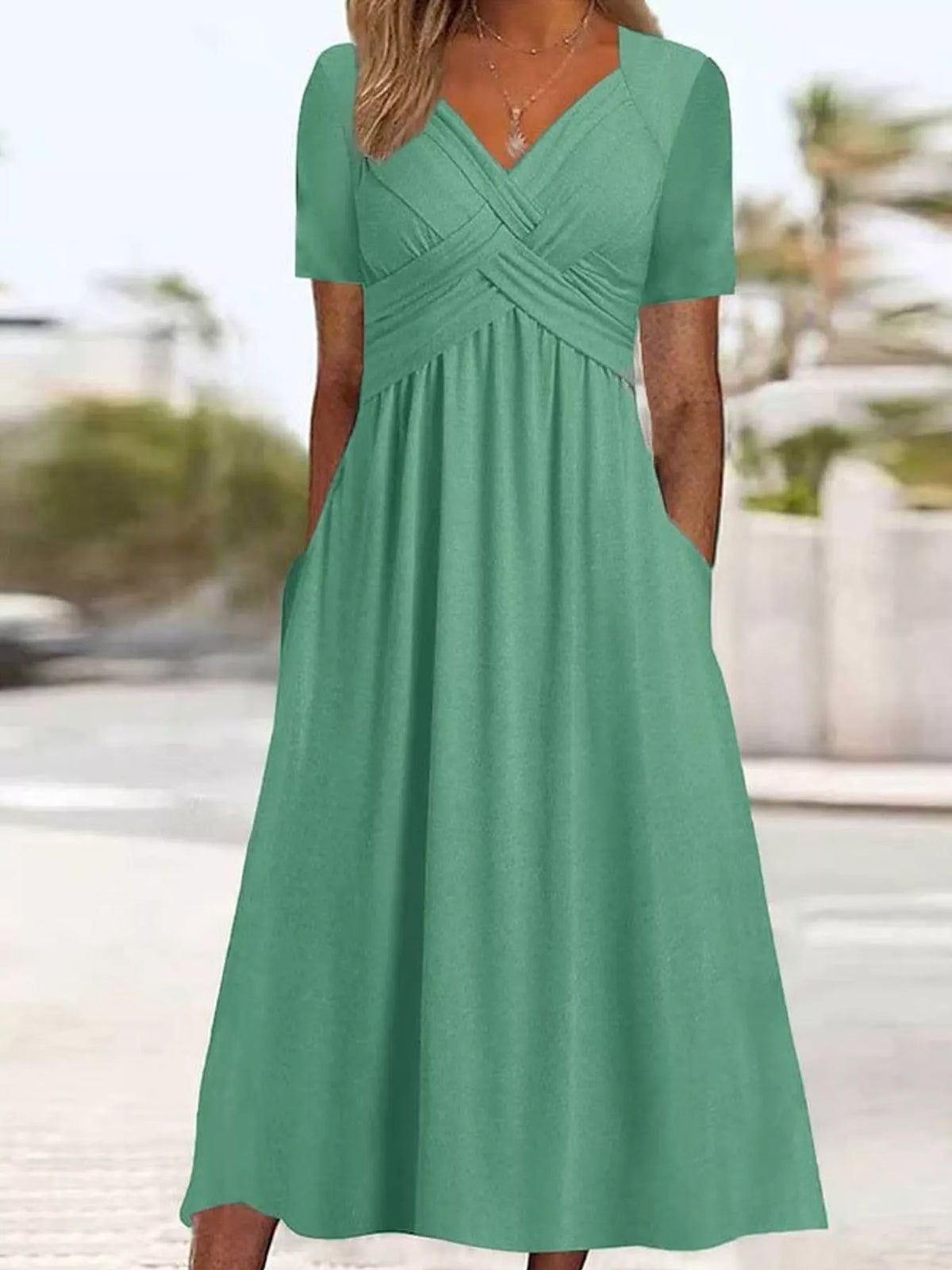 Green crisscross short sleeve midi dress, front view