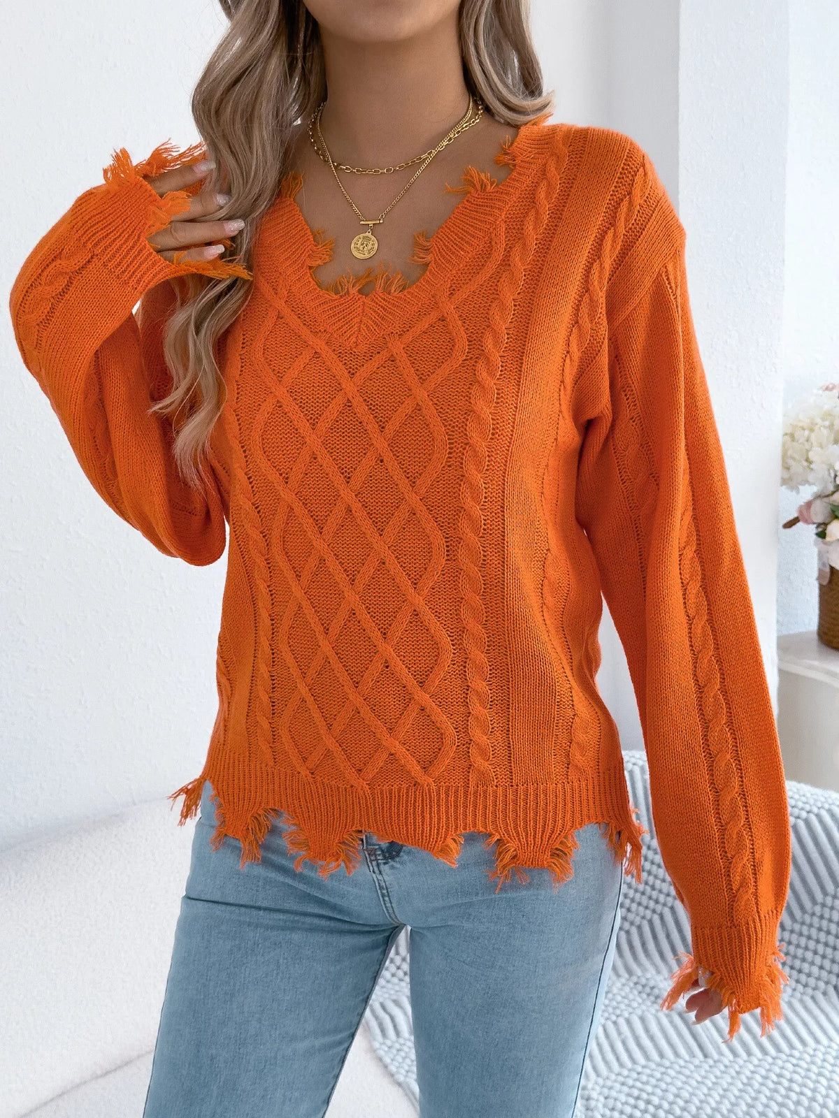 V-Neck Distressed Hem Cable Knit Sweater in orange, front view