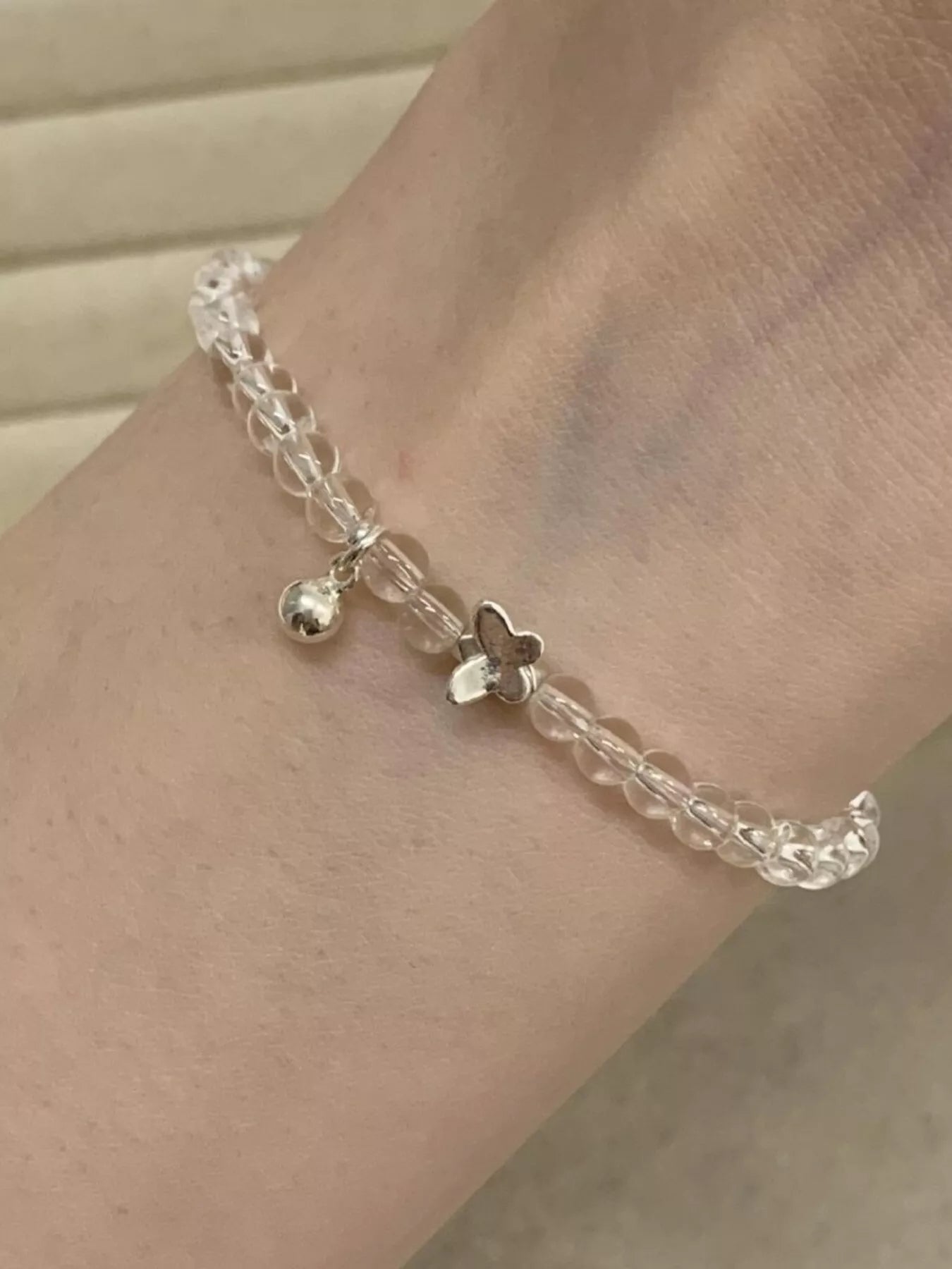 Trendsi Crystal Beaded Bracelet with Butterfly Charm -