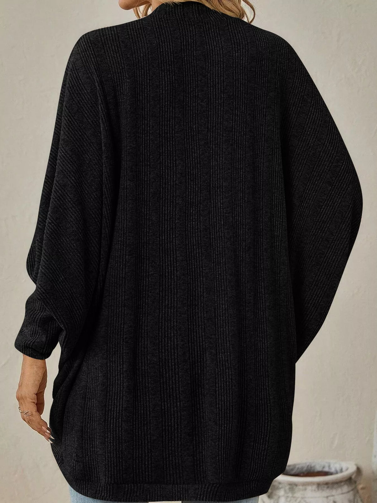 Black open-front batwing sleeve ribbed cardigan, back view