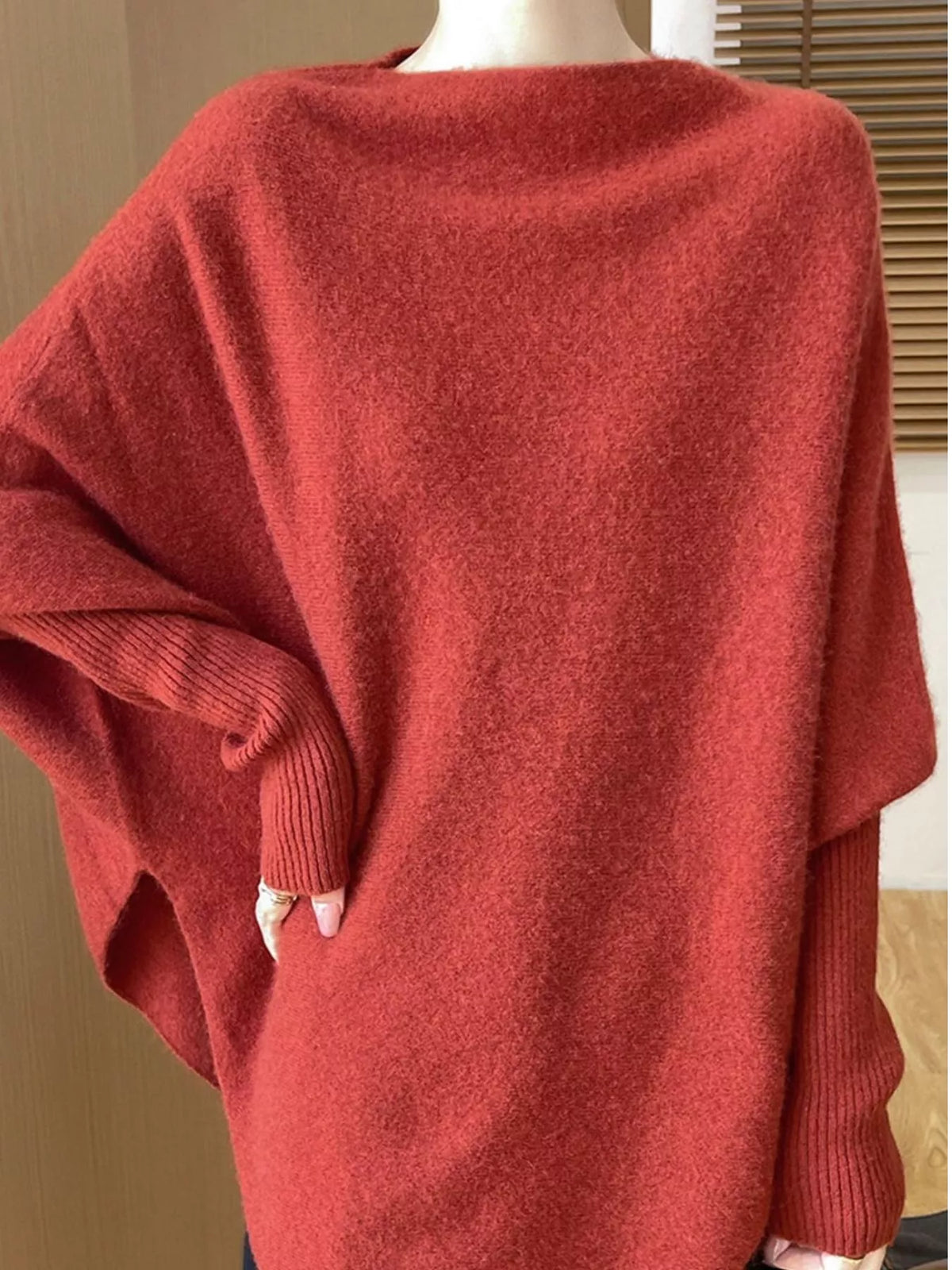 Red asymmetrical lantern sleeve sweater — design and construction details
