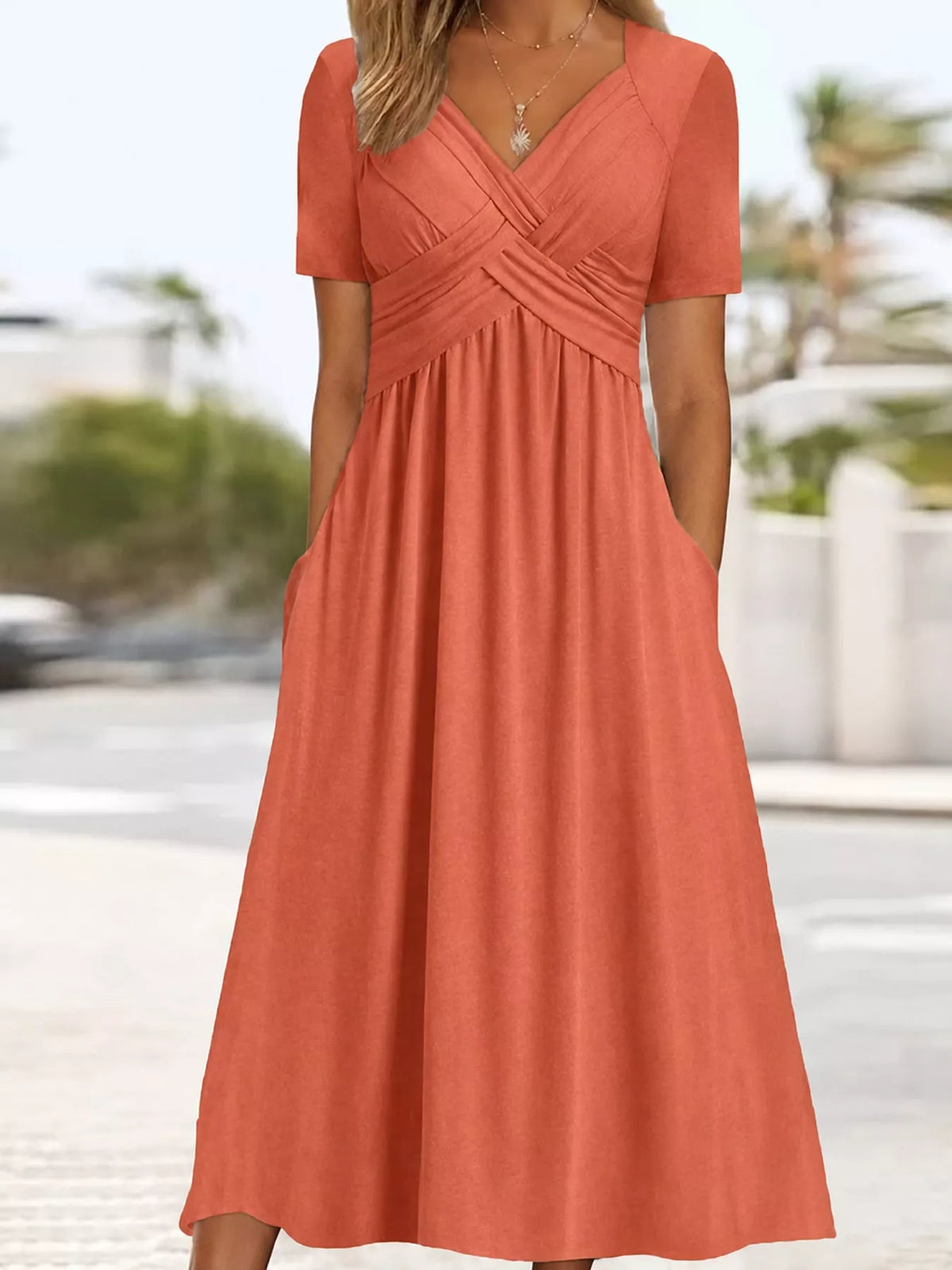 Orange crisscross short sleeve midi dress, front view