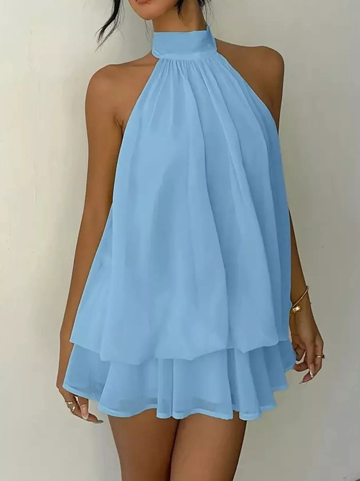Blue halter neck layered mini dress, layered skirt view