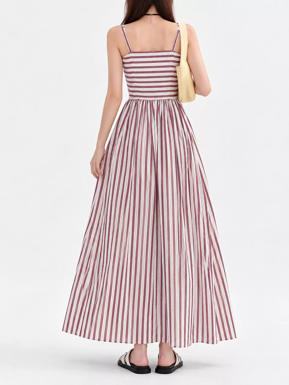 Burgundy and white striped spaghetti strap maxi dress with gathered bodice and pockets, back view