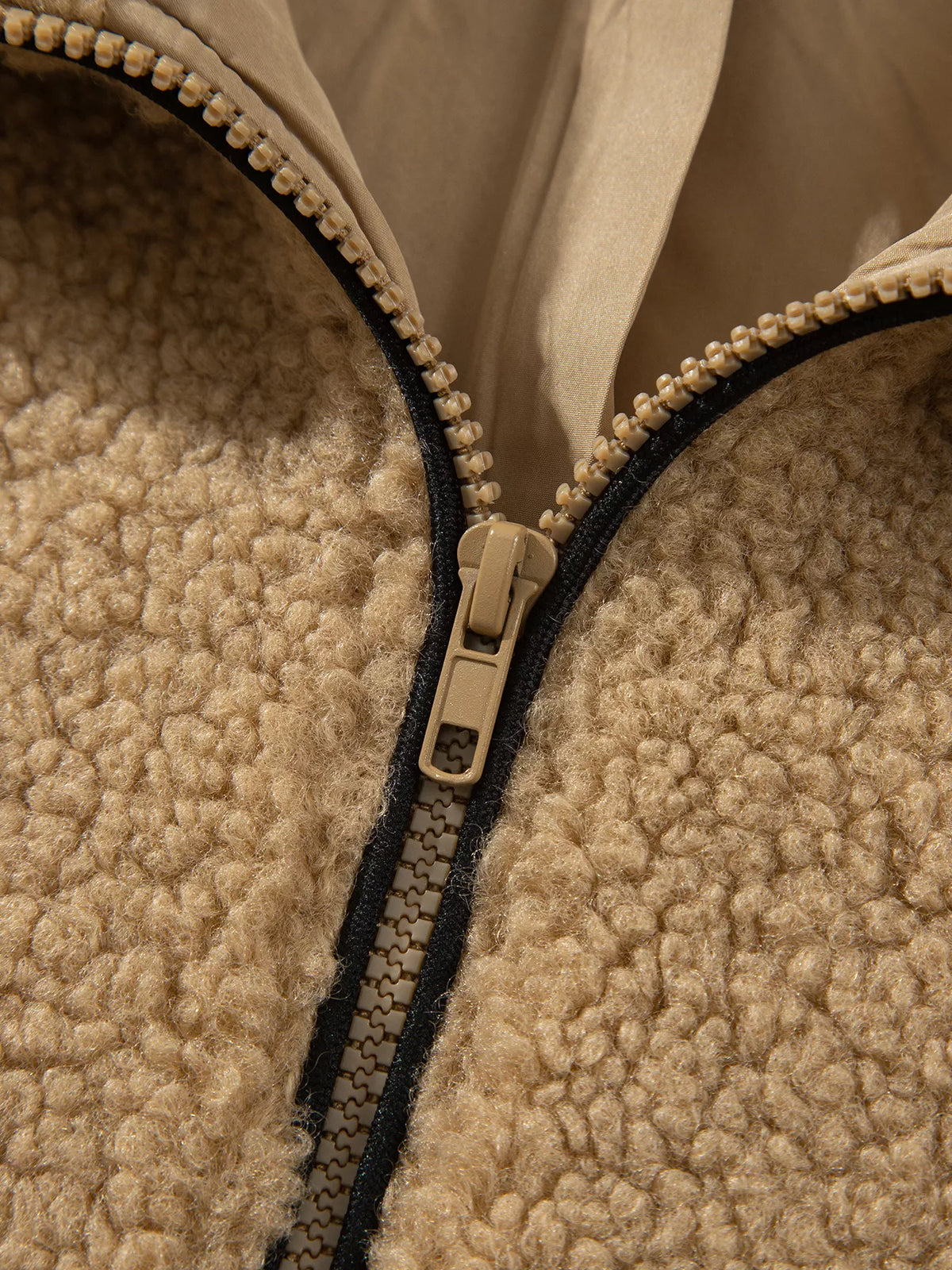 Camel fleece zip-front jacket with contrasting seam trim, zip detail