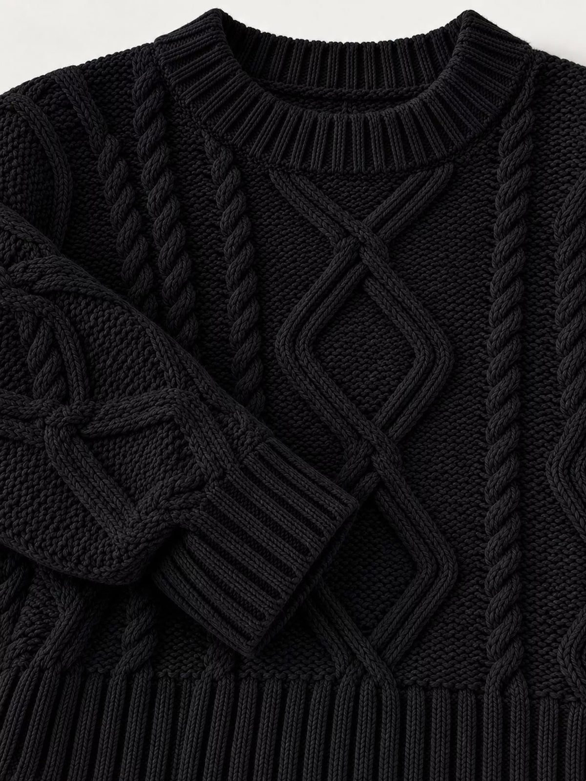 Black cable-knit round neck sweater, detail view