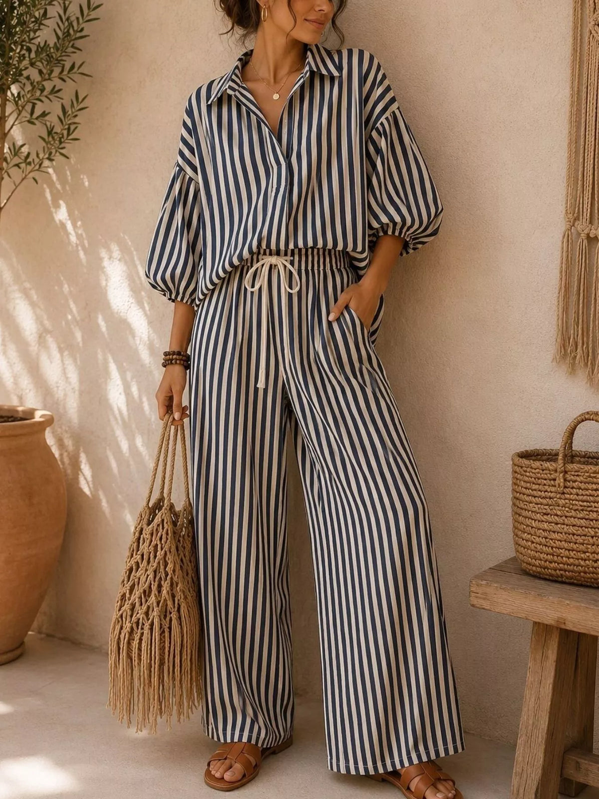 Black striped shirt and wide-leg pants set, front view with drawstring waist