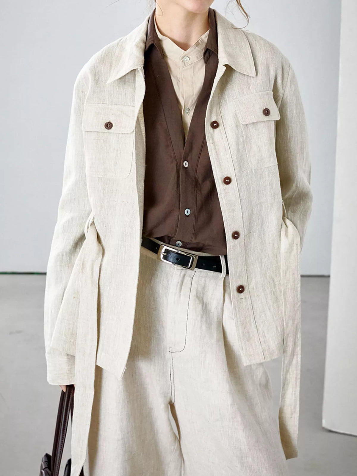 Belted shacket, beige full angled front