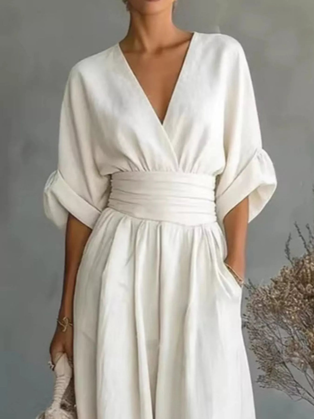 White V-neck wide-leg jumpsuit, bodice detail