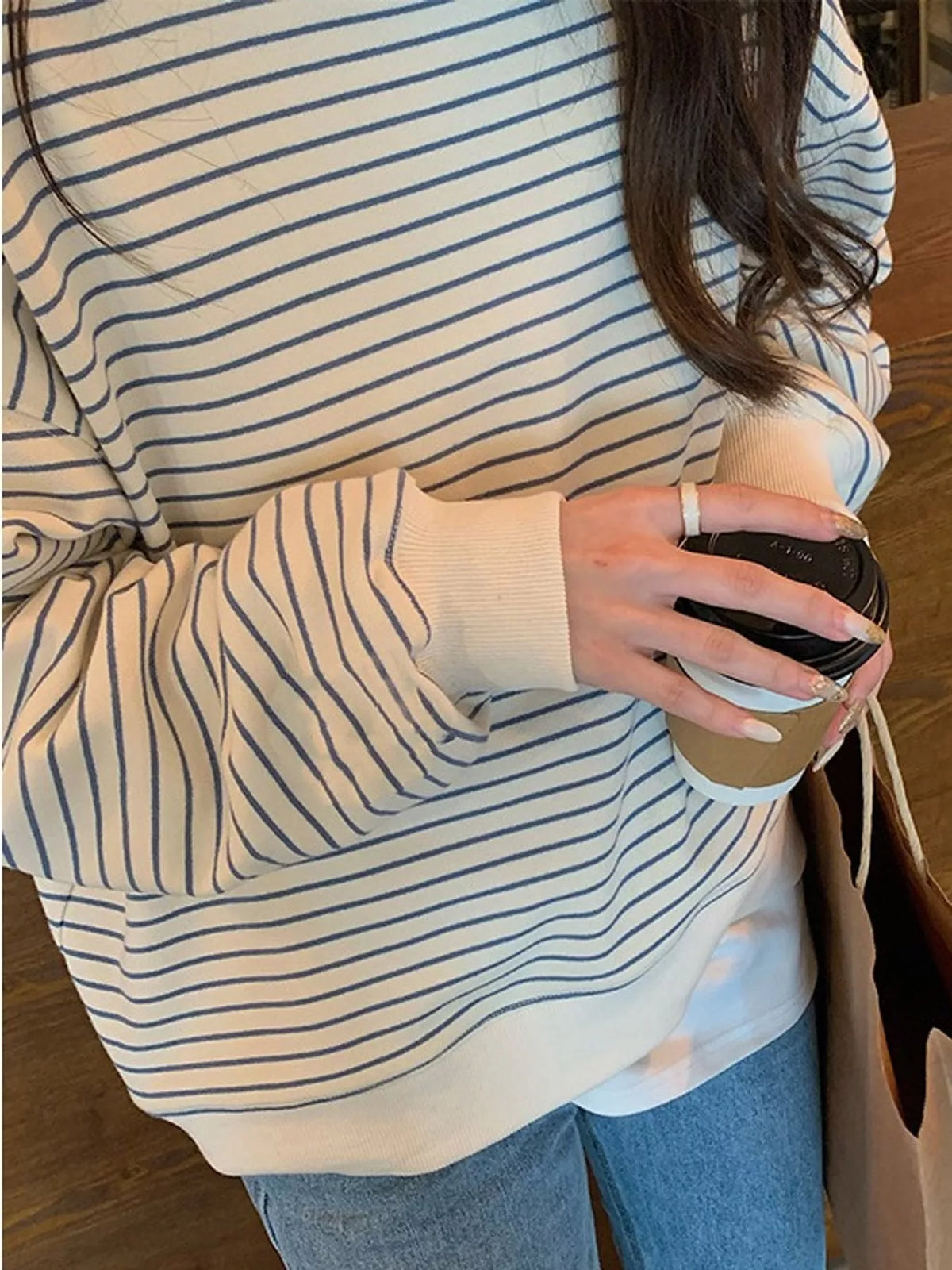 Cream and blue striped long sleeve crewneck t shirt, detail view