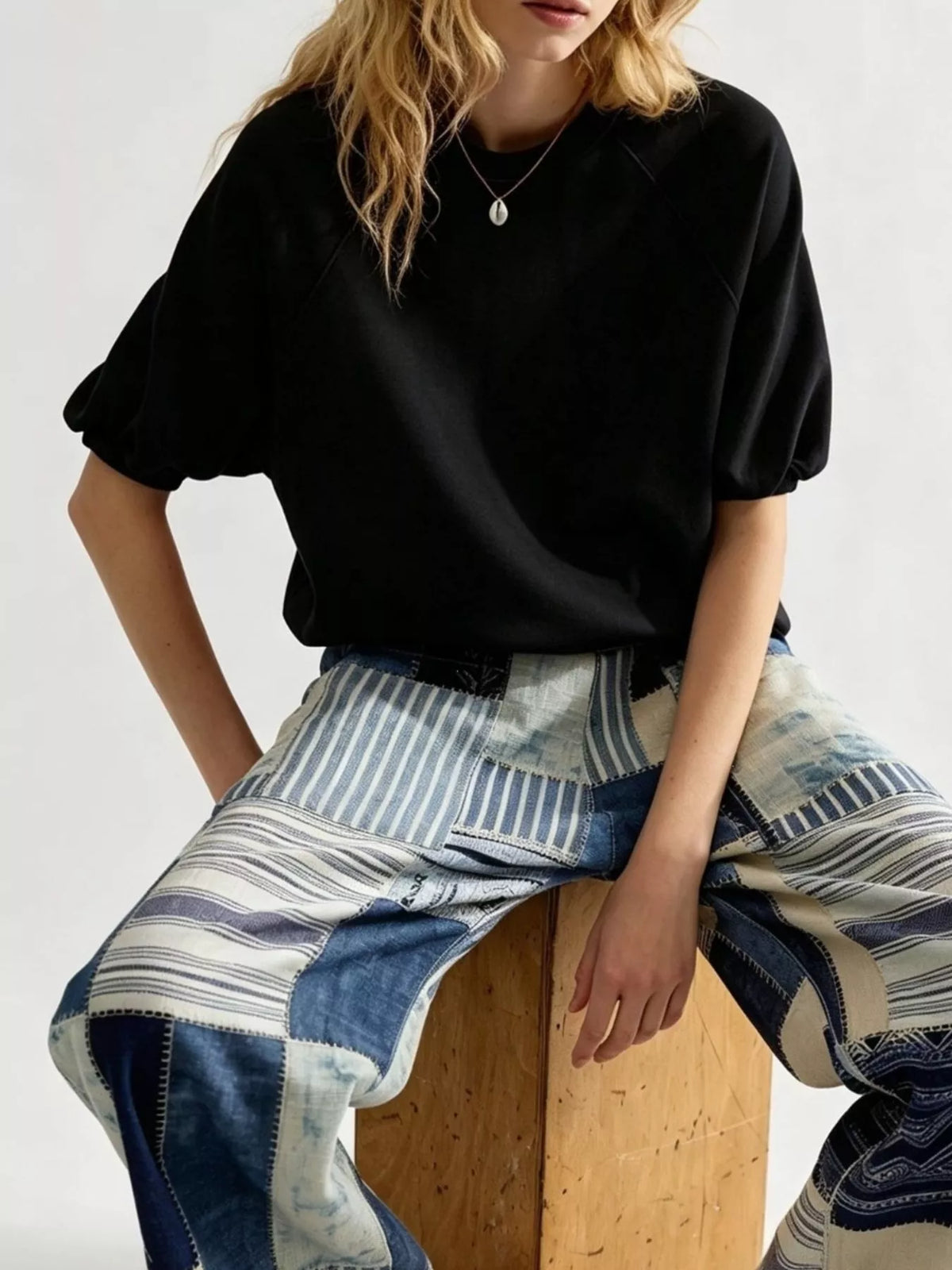 Women's Raglan Short-Sleeve Sweatshirt in black — front view
