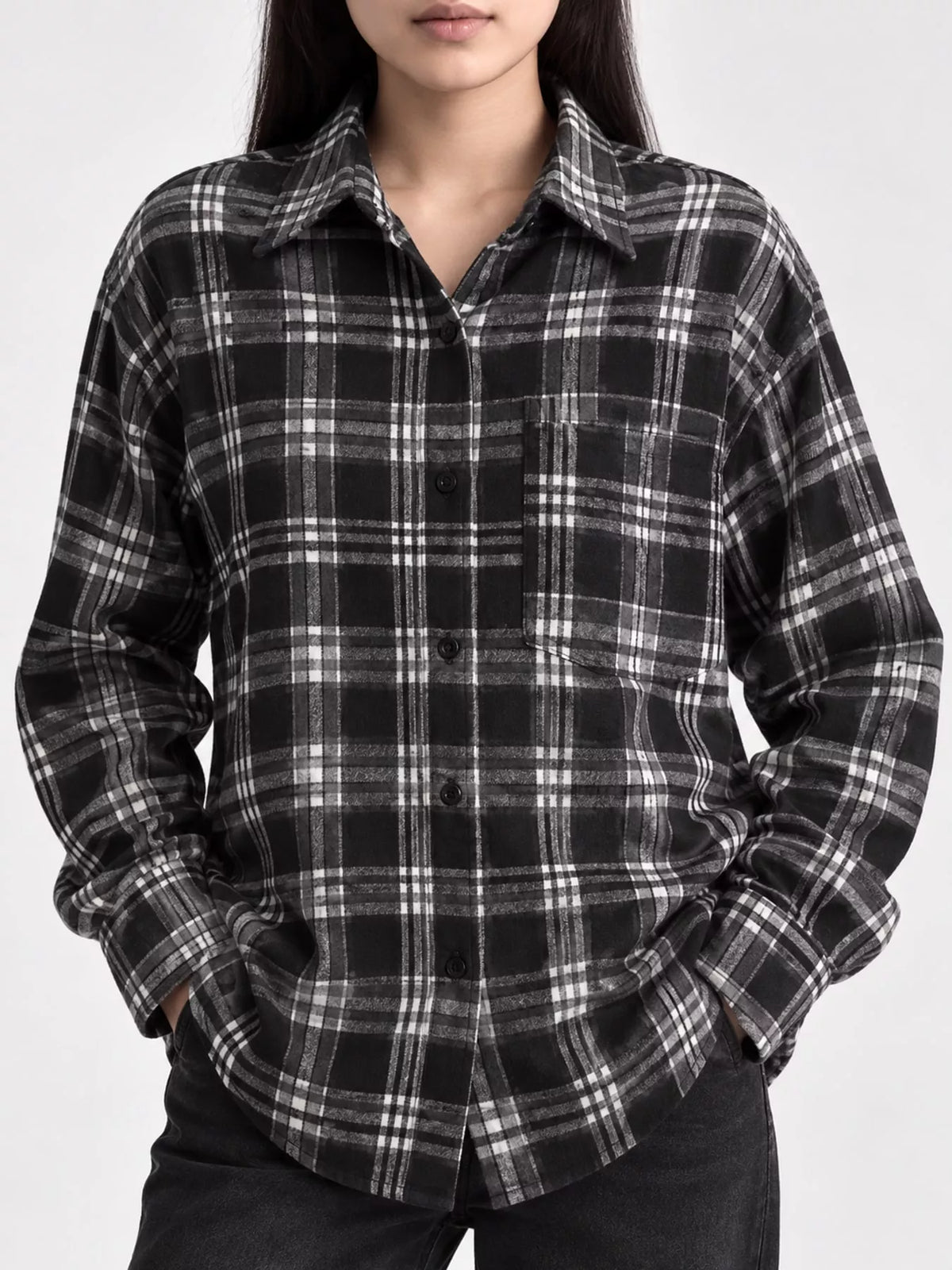 Black and white plaid button-up shirt with chest pockets