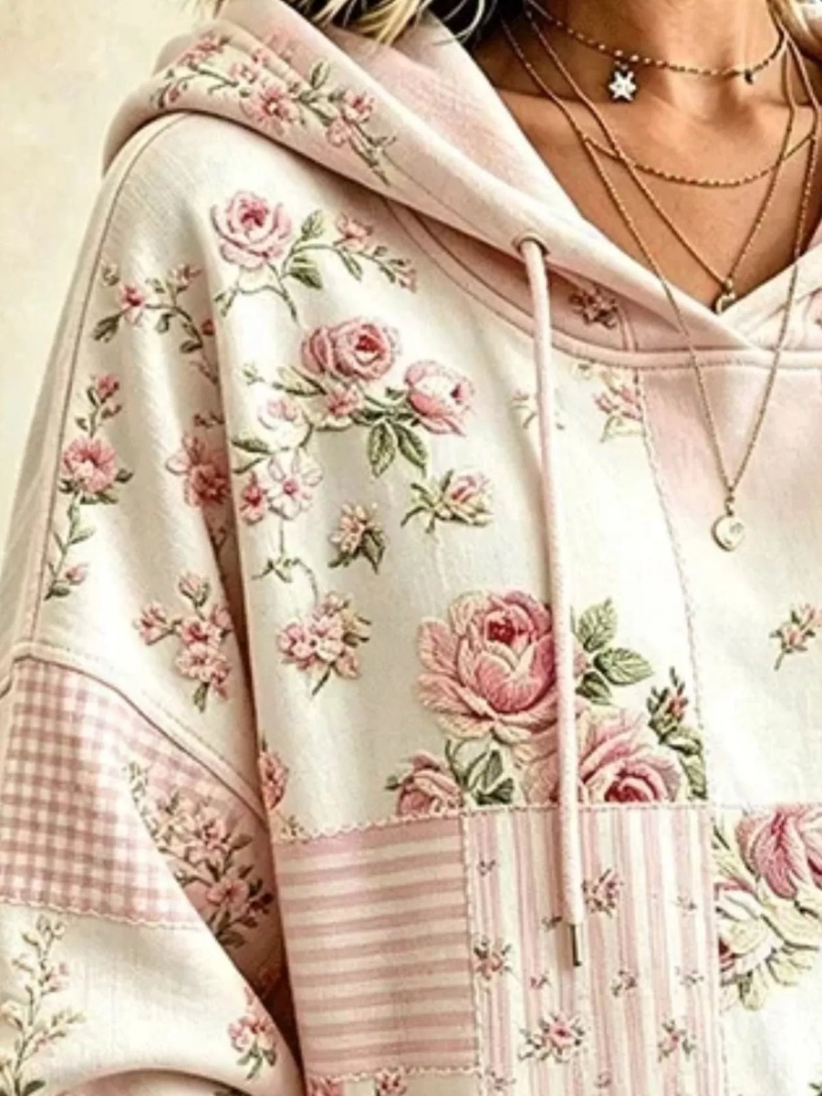 Cream and pink floral drawstring dropped-shoulder hoodie, hood and floral print detail.