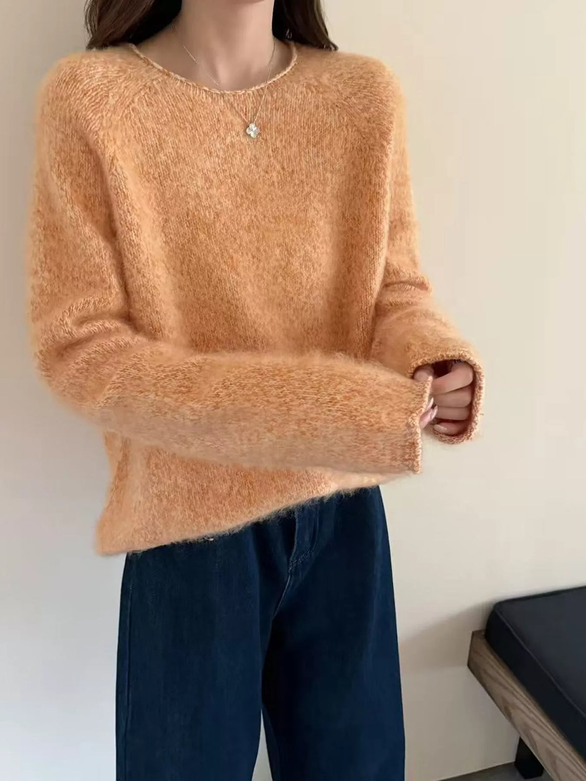 Round neck long sleeve sweater, front view on model