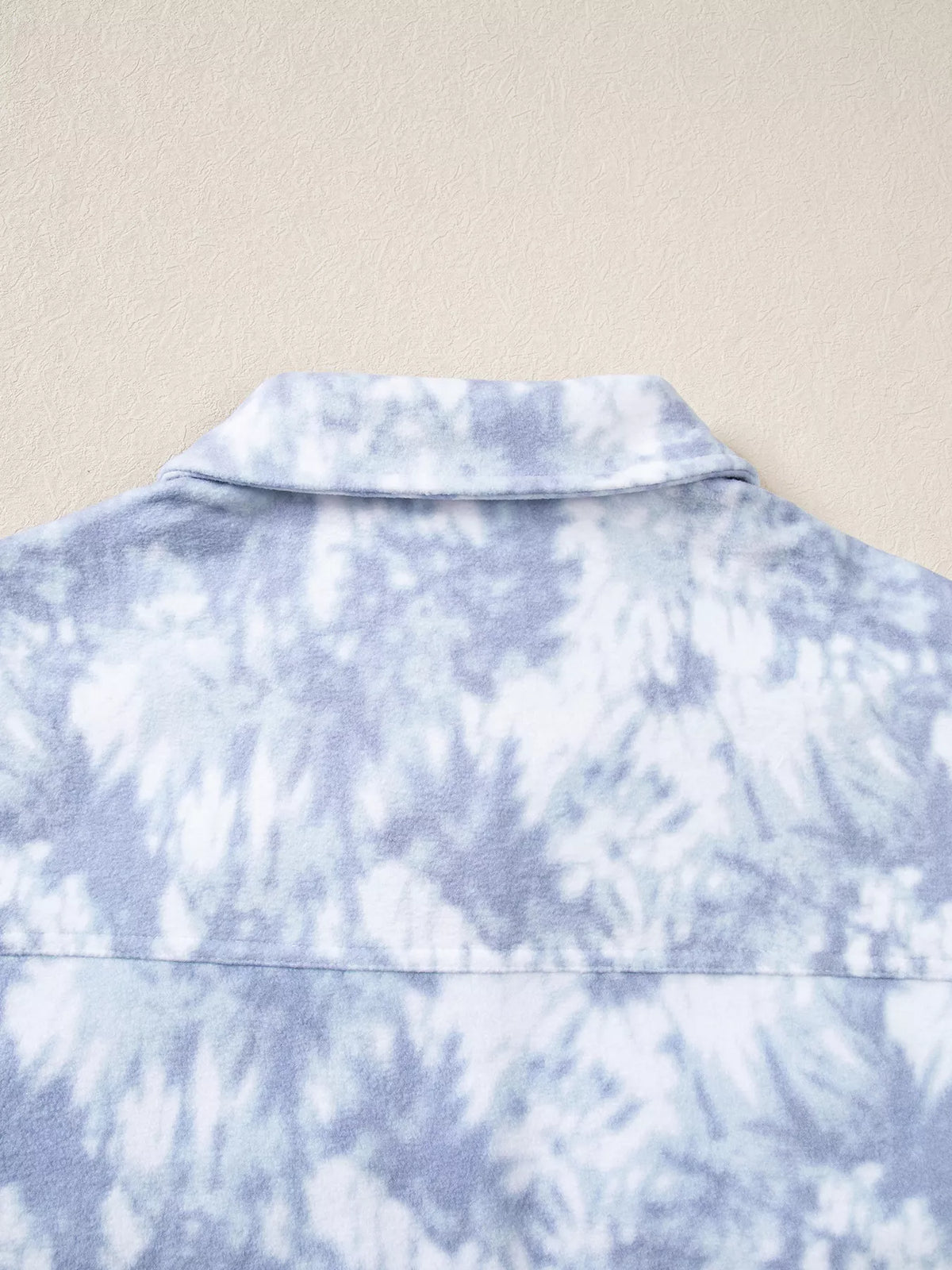 Back yoke on light blue abstract print fuzzy collar tunic jacket