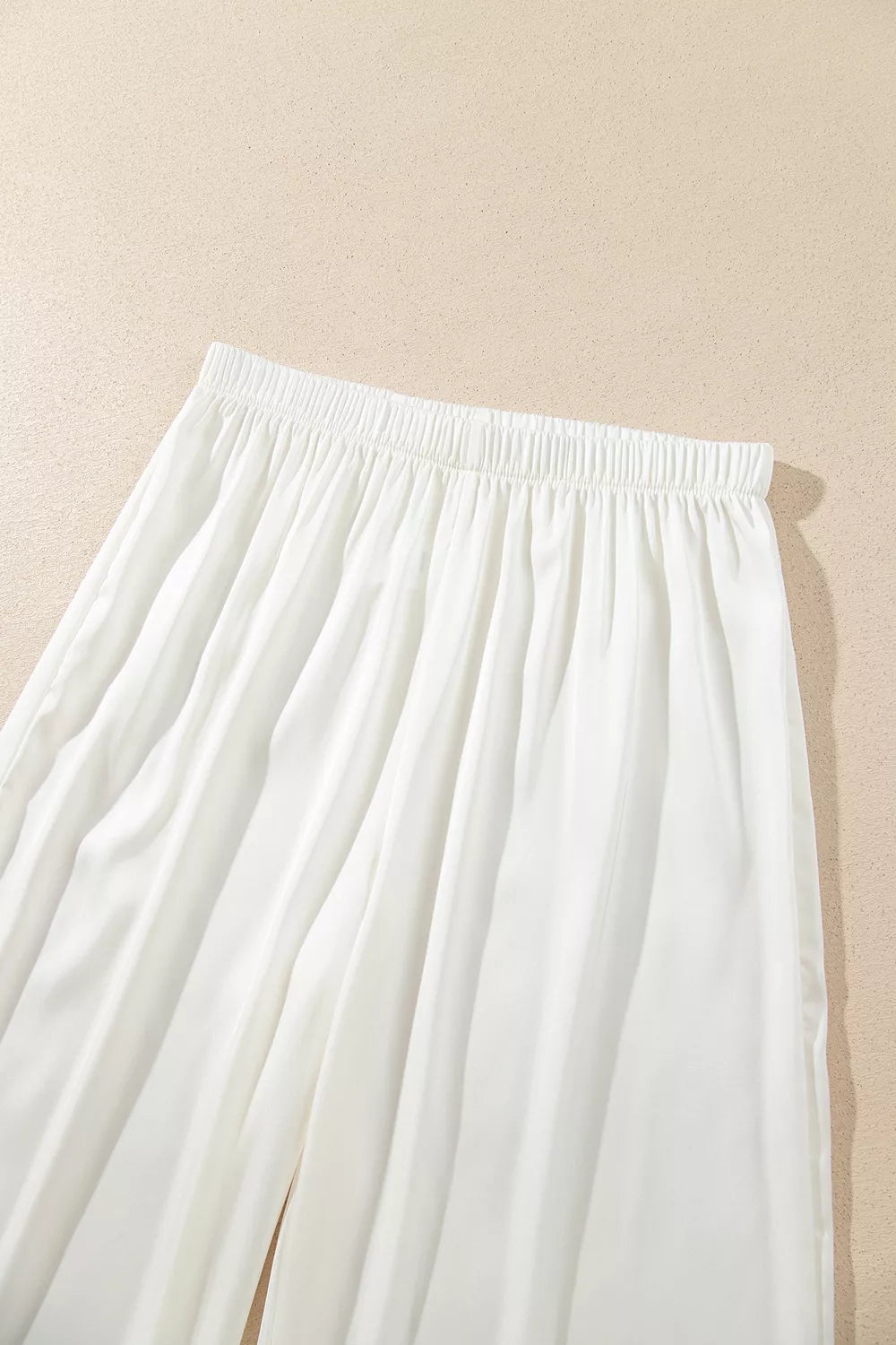 Ivory lace-trim button-front pajama set, elastic waistband detail.