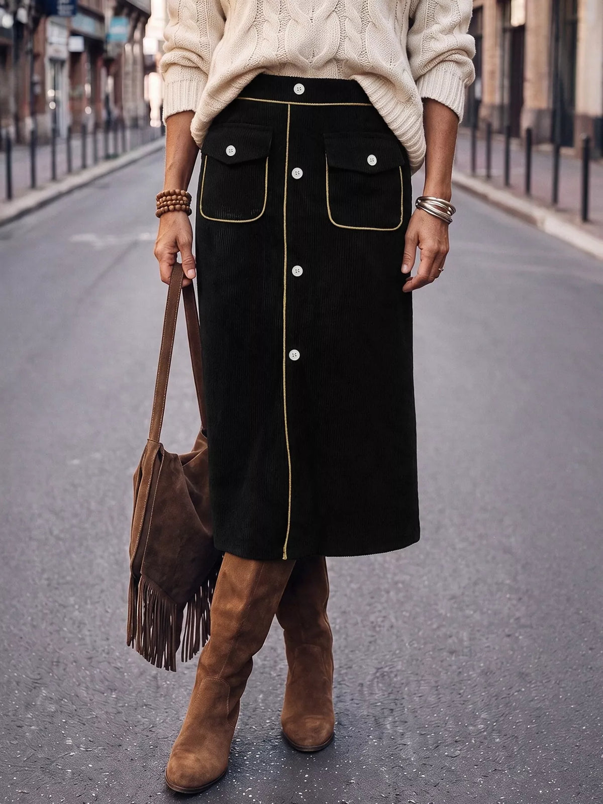 Black corduroy button-front midi skirt, front view