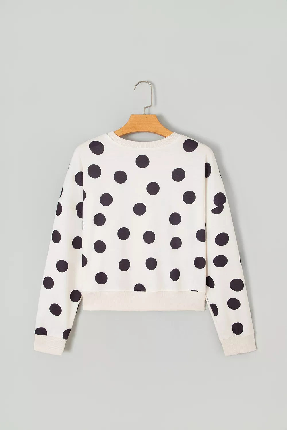 White polka dot round neck sweatshirt, back view