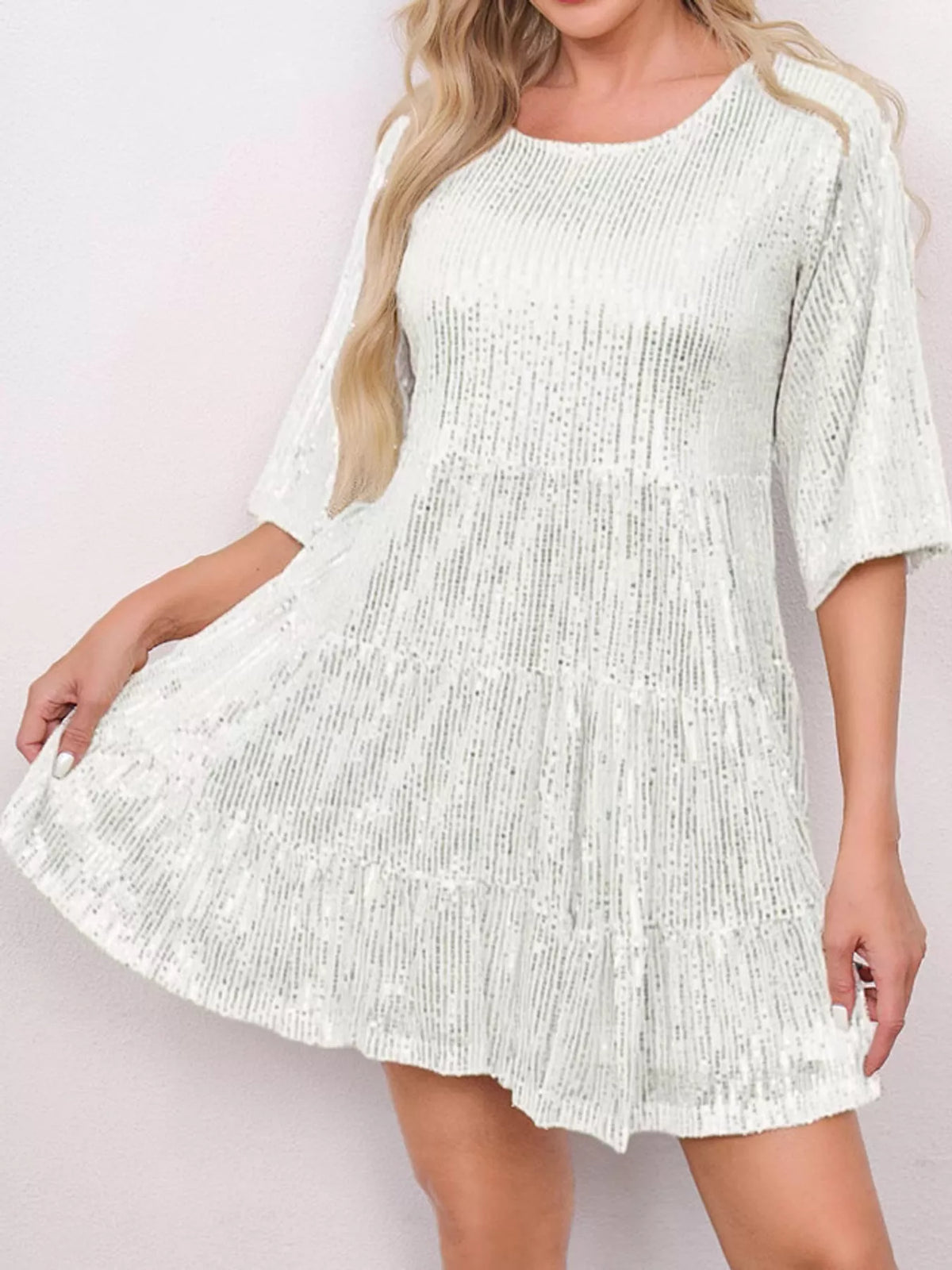 Round neck 3/4 sleeve mini dress, front view on model