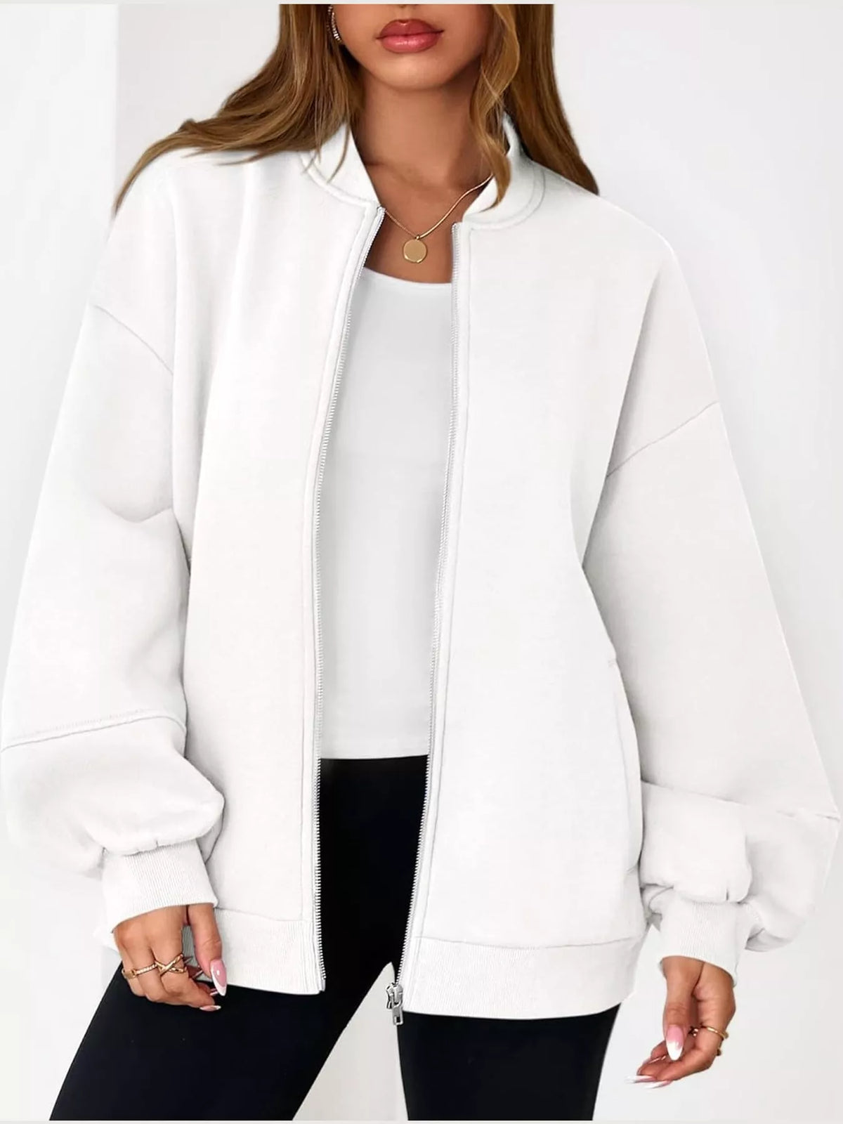 White oversized zip-up jacket — front view