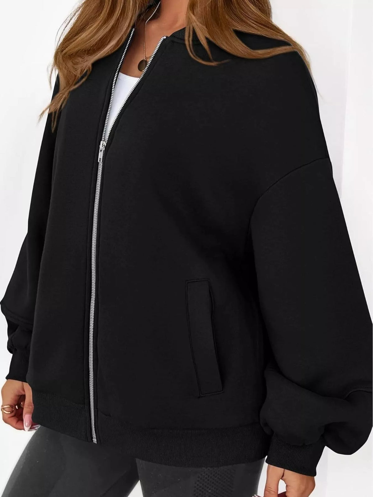 Black oversized zip-up jacket — front view