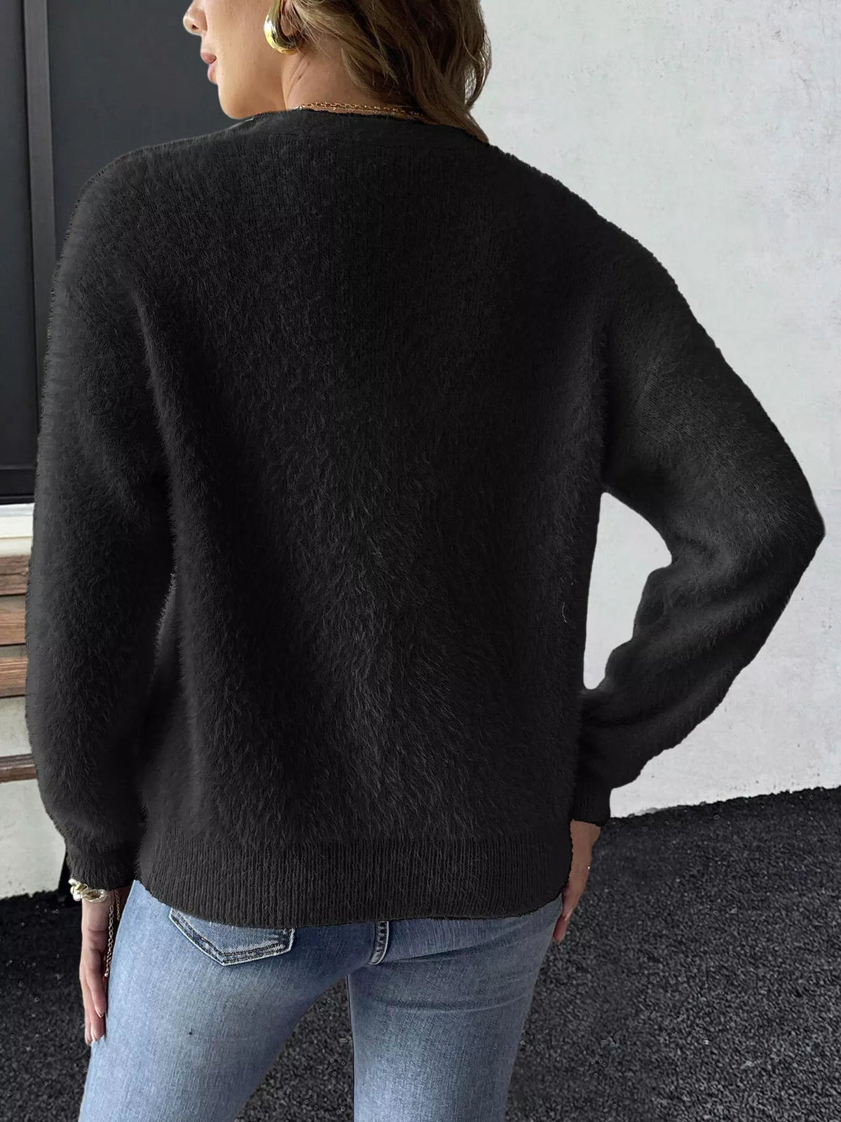 Black strawberry-applique cardigan, back view