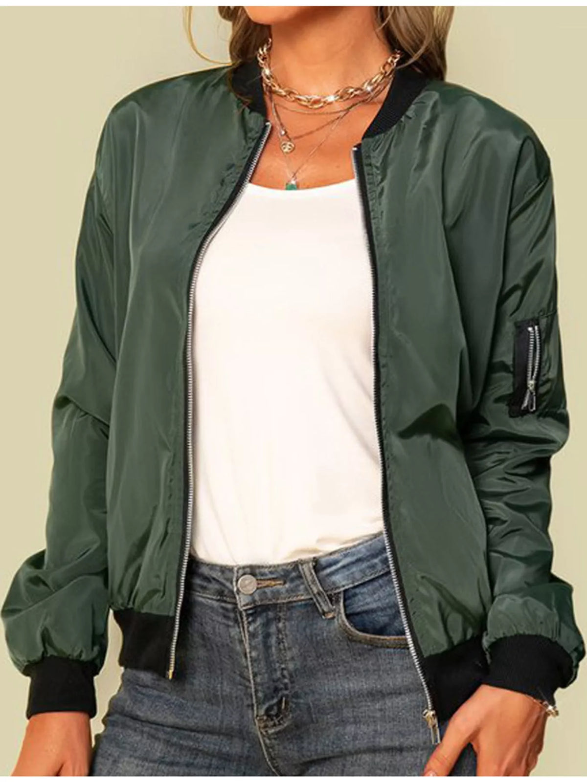 Green zip-up bomber jacket — front view