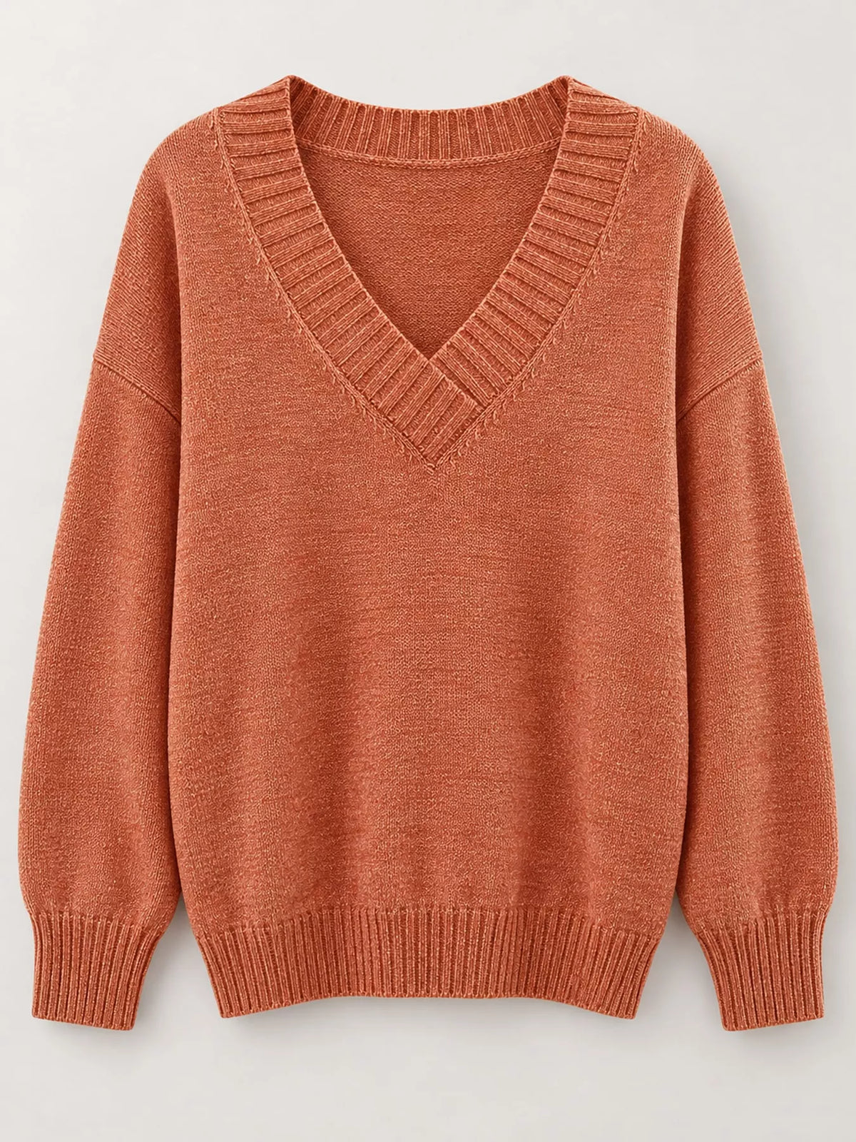V-neck sweater, rust flat lay