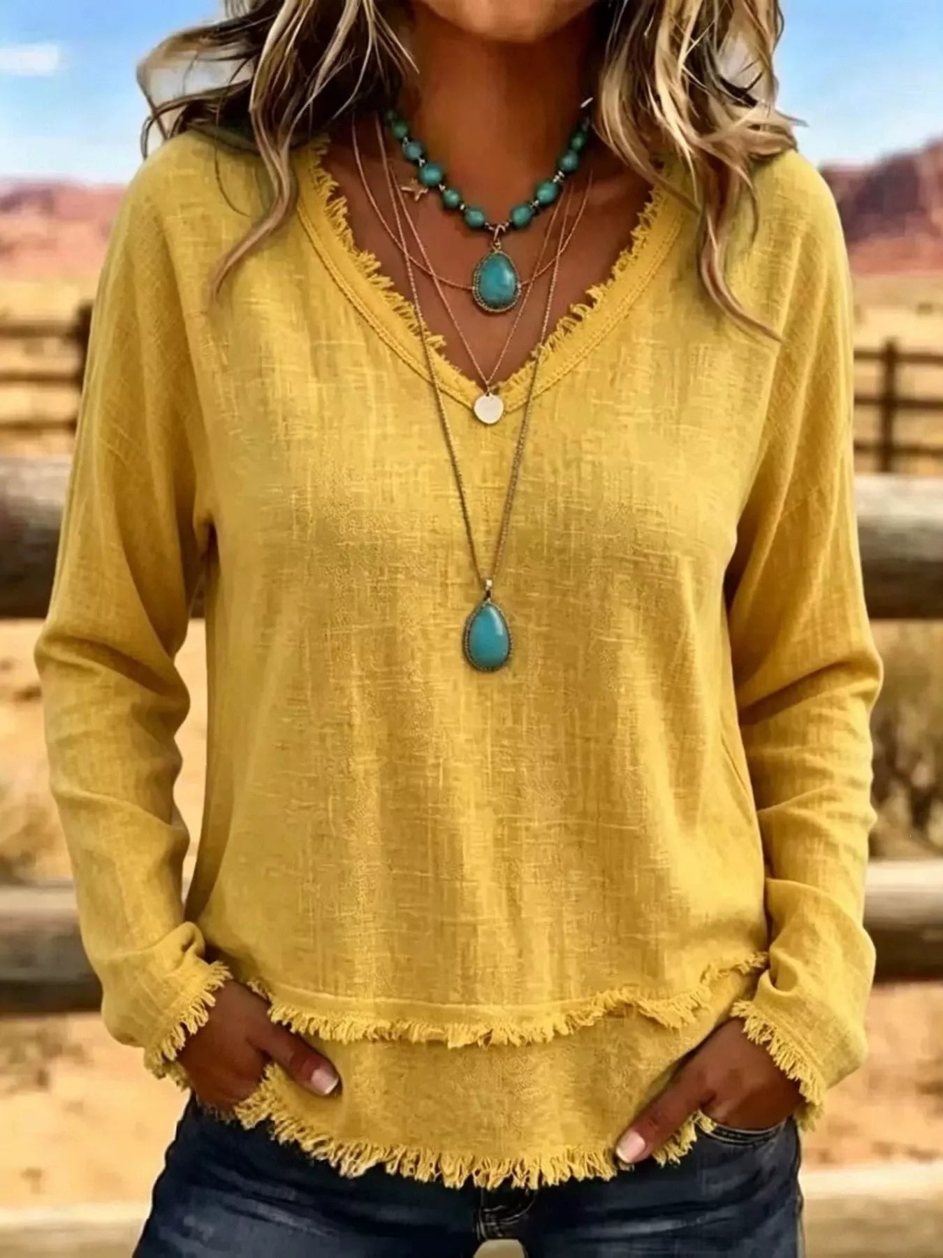 Trendsi V-Neck Long Sleeve Blouse with Frayed Hem Detail -