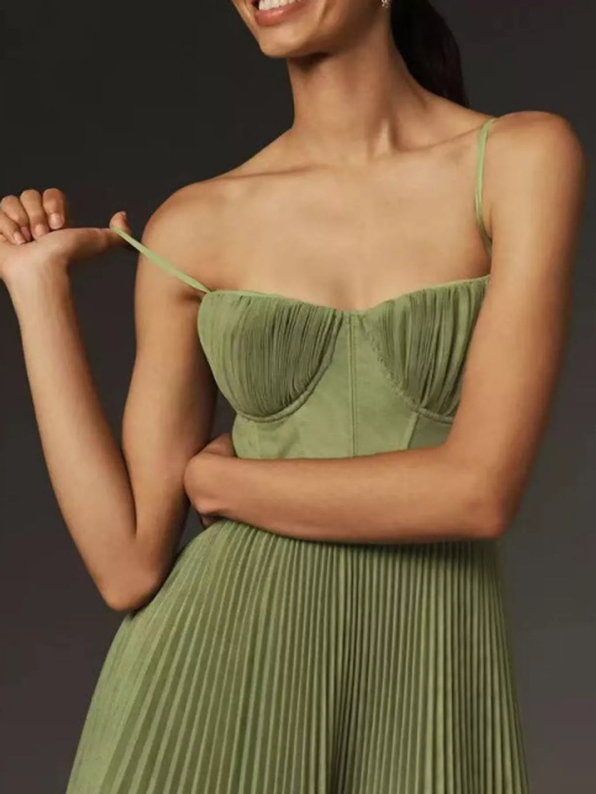 Green pleated sweetheart neck midi dress — design and construction details