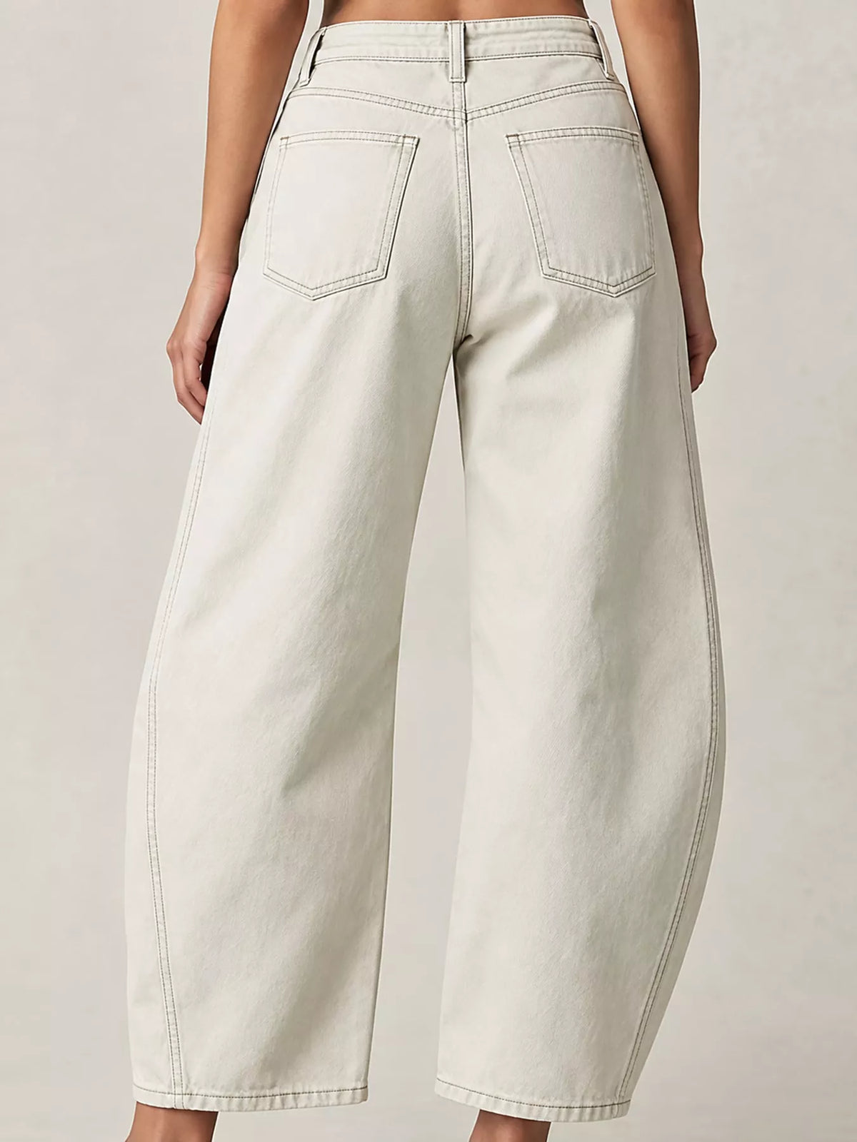Cream barrel-leg jeans, back view