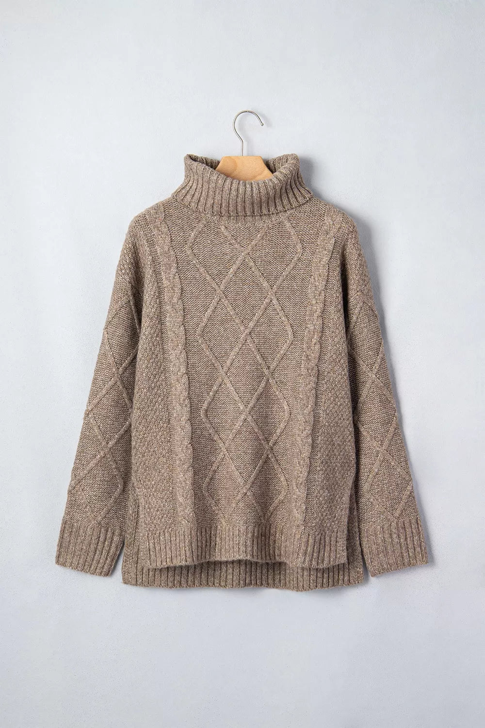 Cable-knit sweater, hanging front