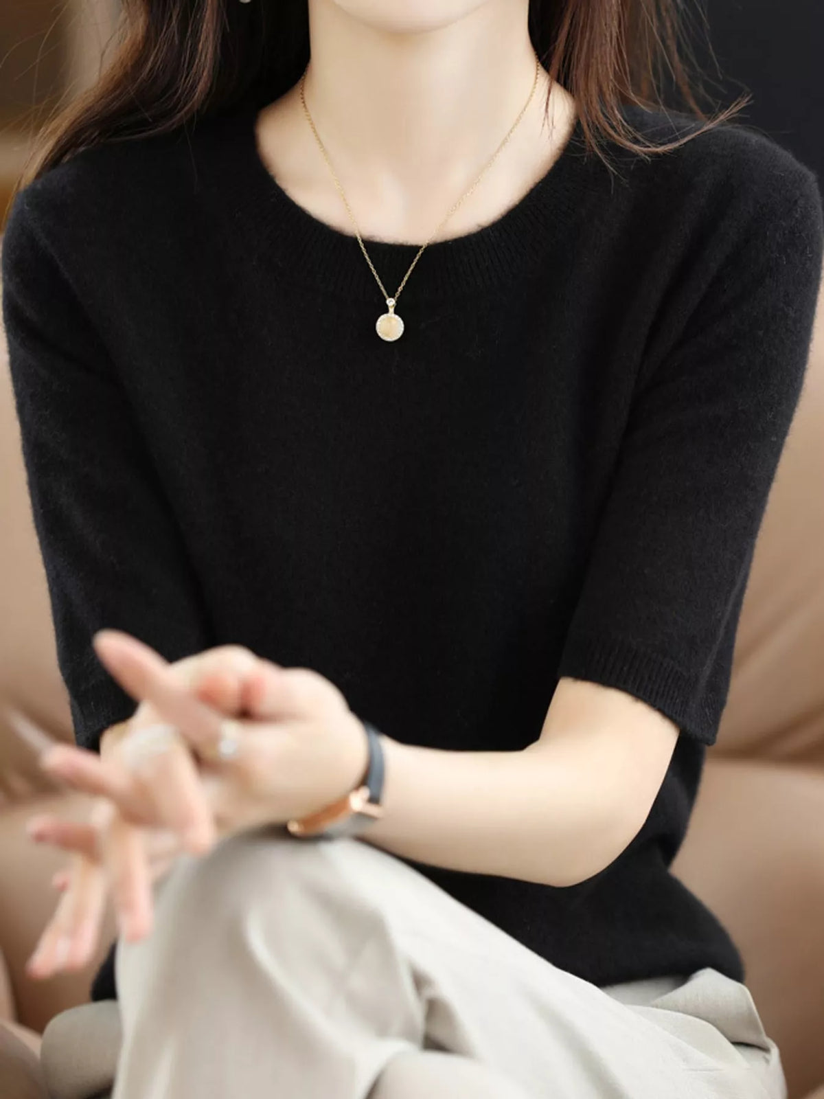 Black round neck short-sleeve sweater